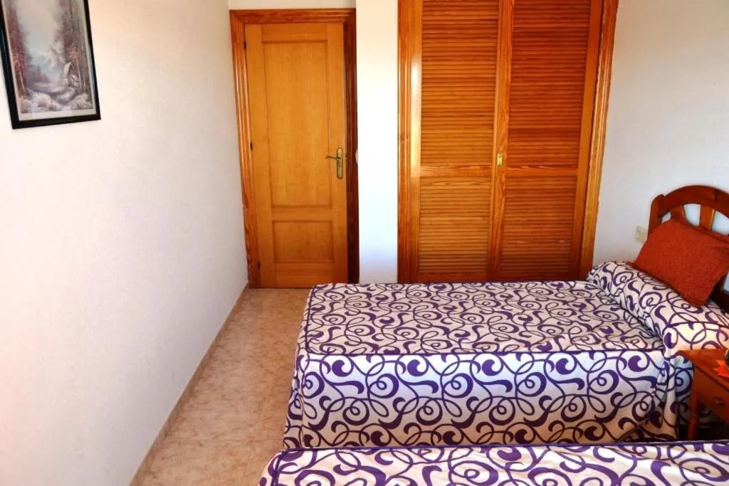 Photo of the whole room, Bed in Apartamentos Turísticos Hawaii 6
