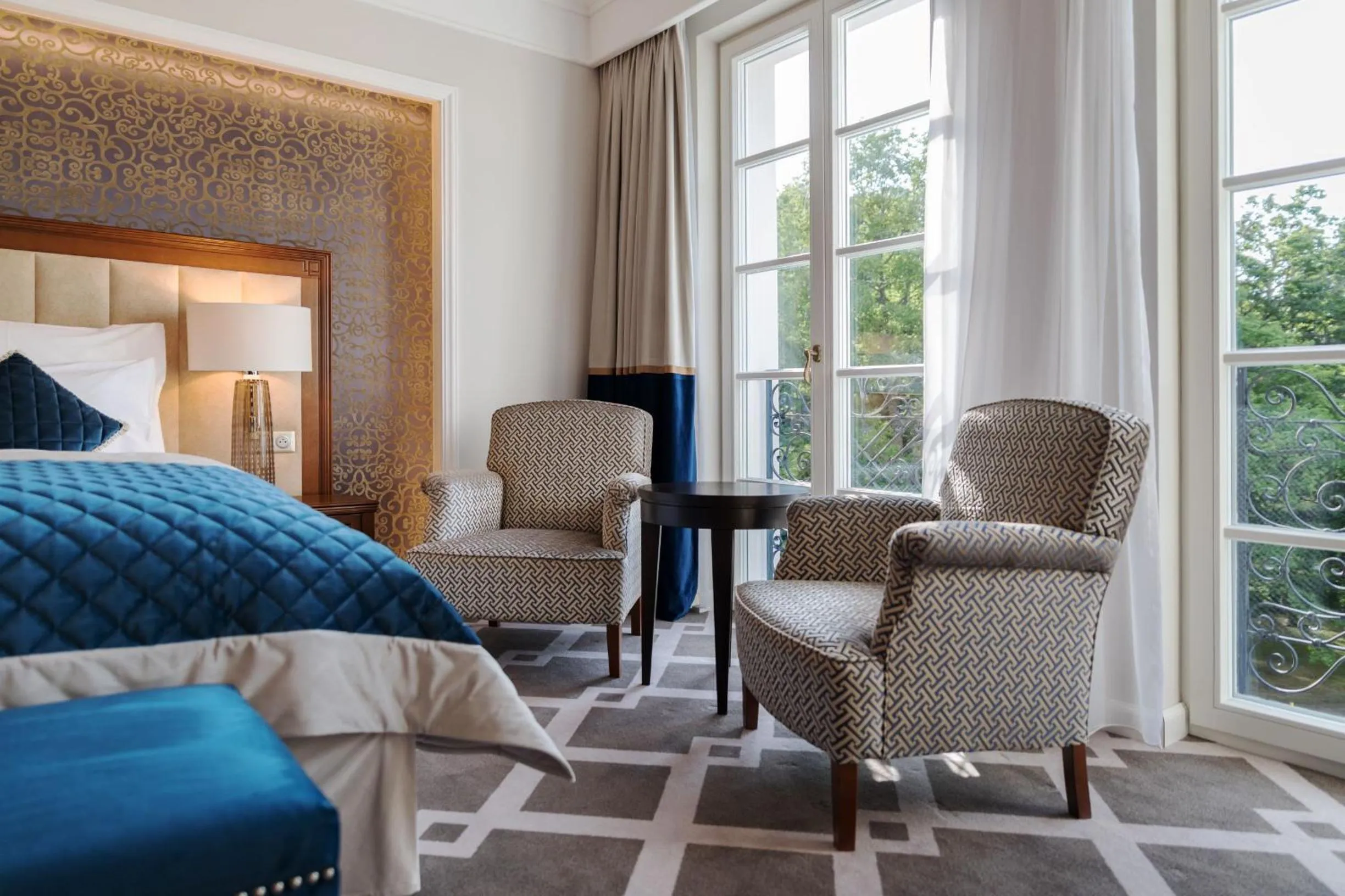 Seating area, Bed in Palace Art Hotel Pezinok