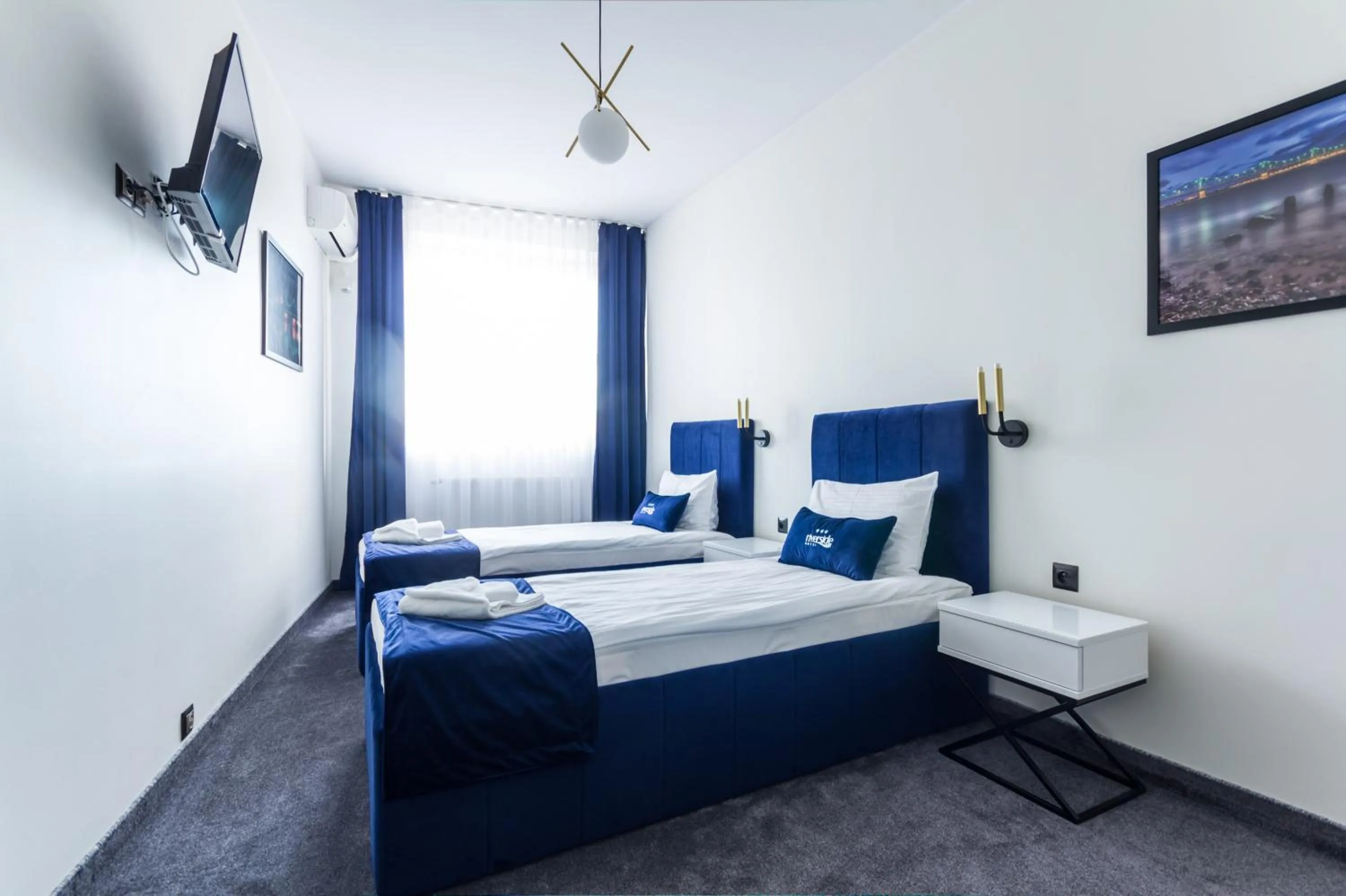 Bed in Riverside Hotel