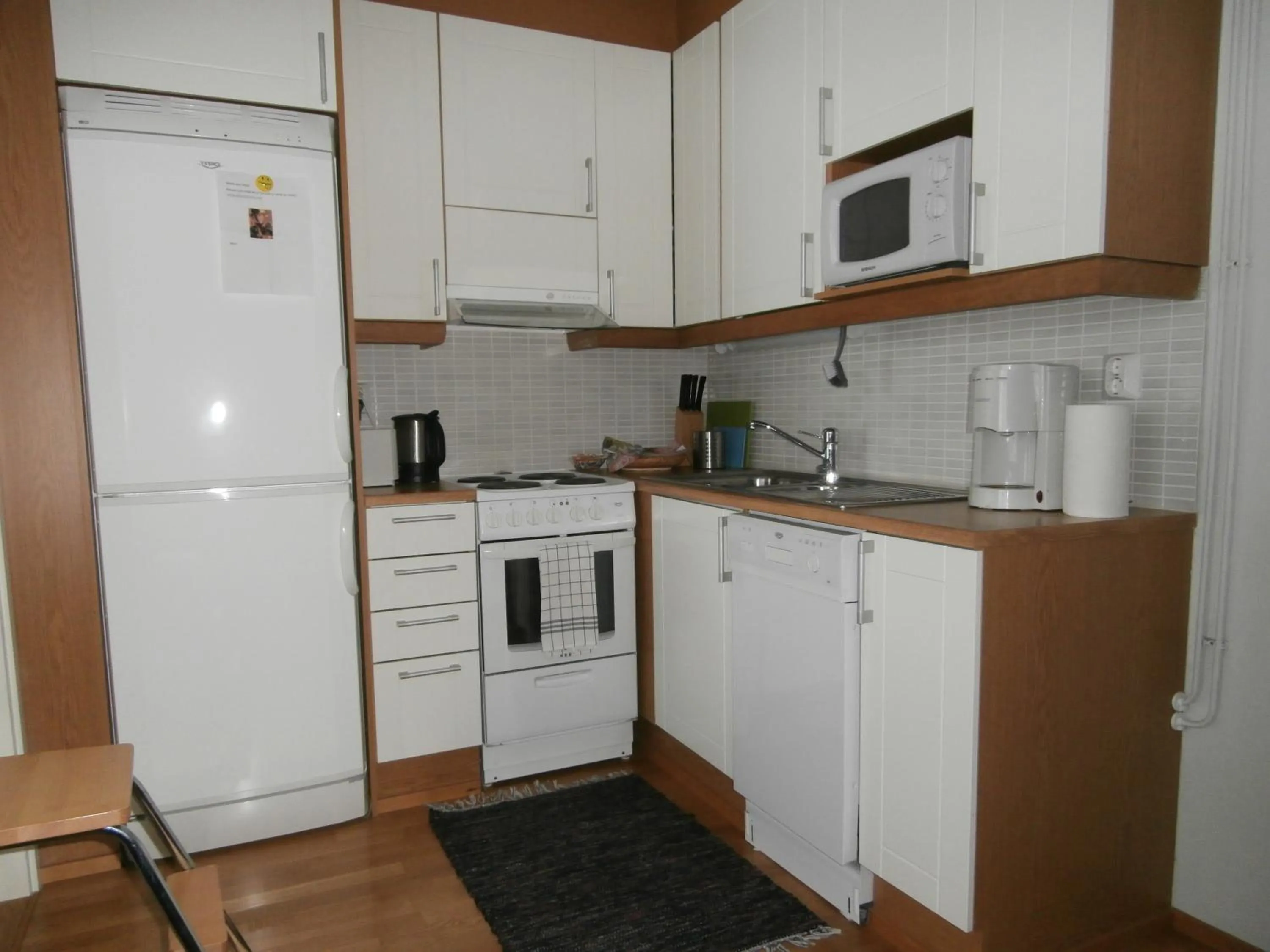 Kitchen or kitchenette in Huoneistohotelli Nallisuites