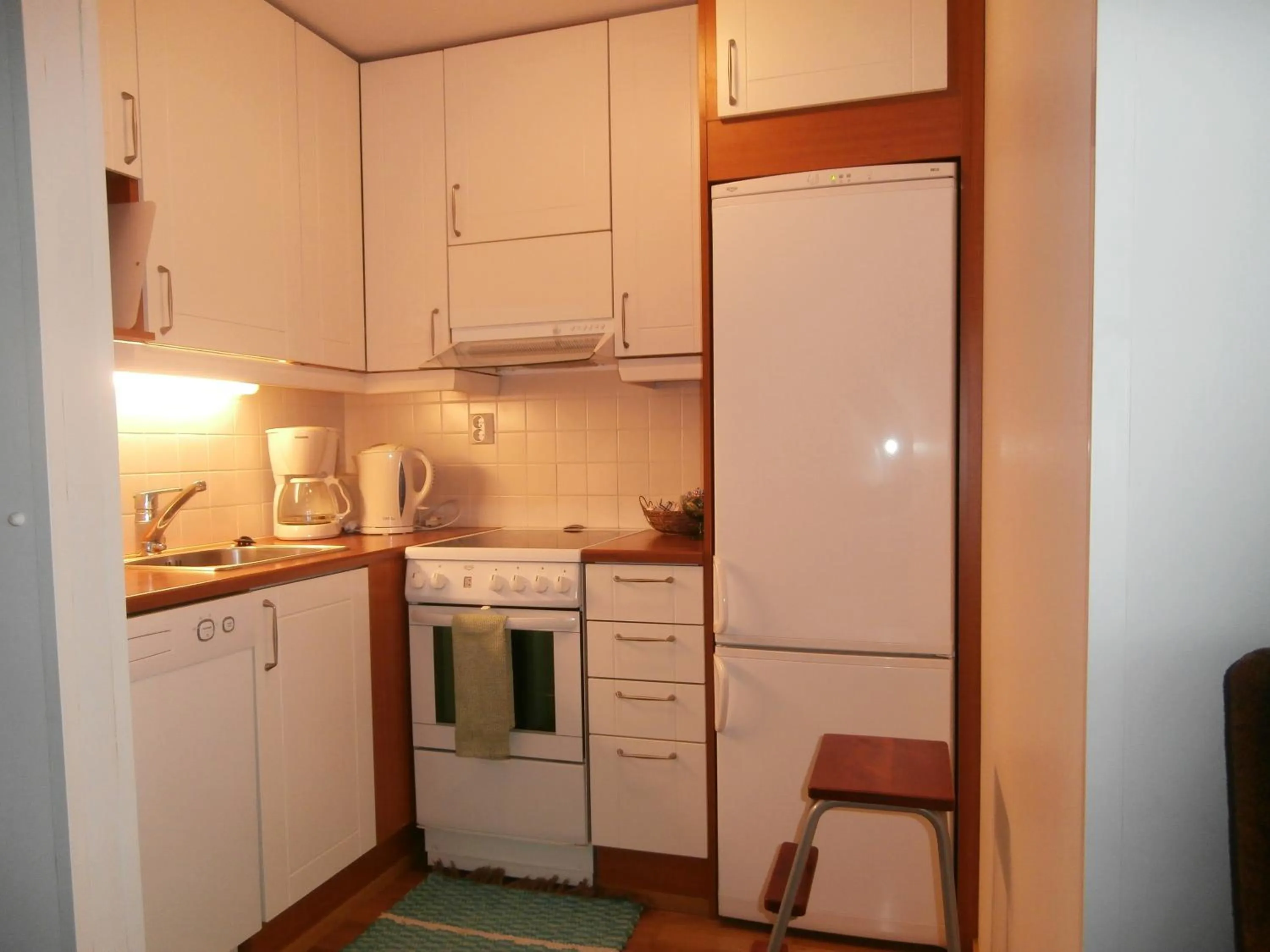 Kitchen or kitchenette in Huoneistohotelli Nallisuites