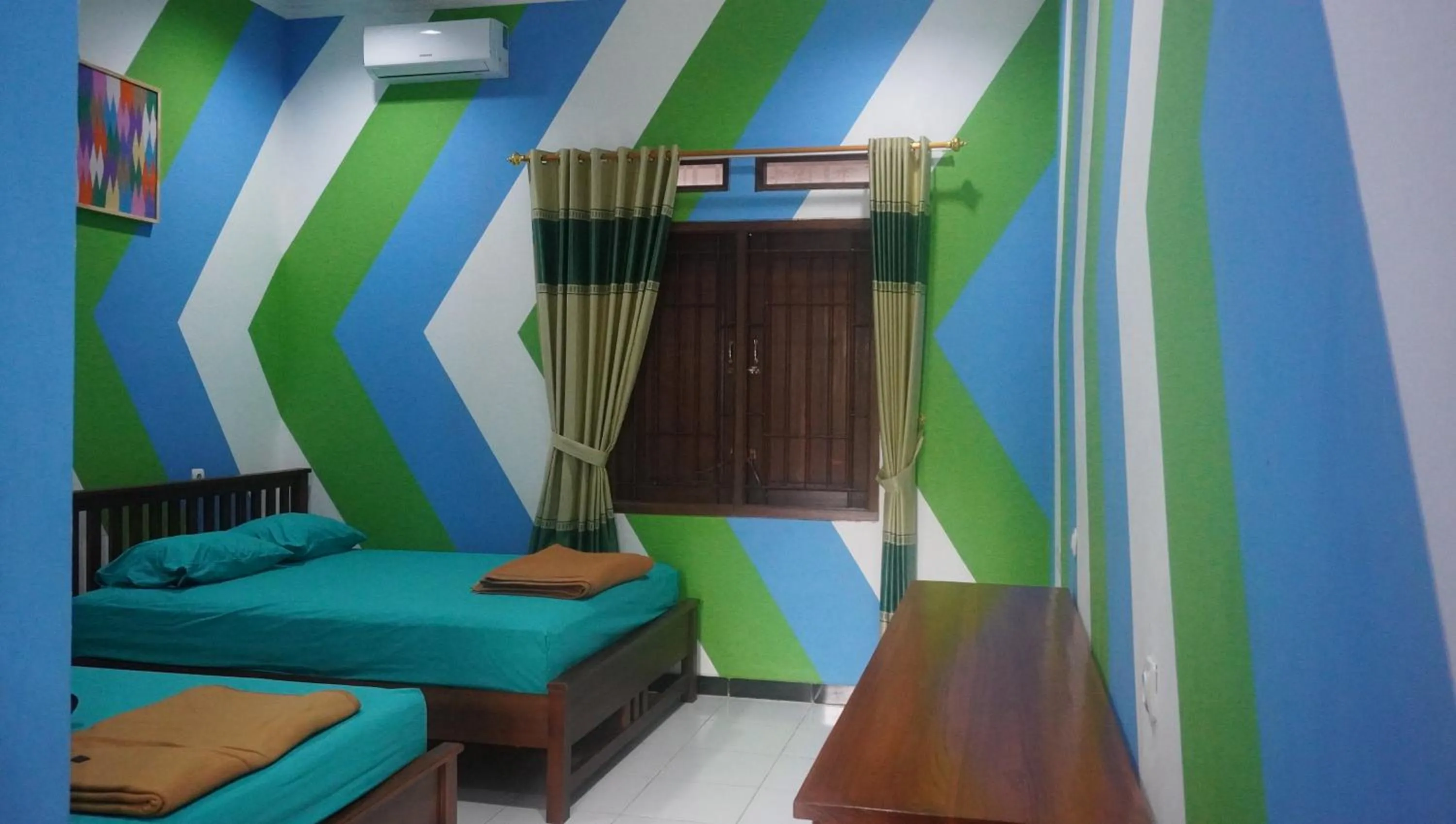 Bed in JOGLO Greenhouse