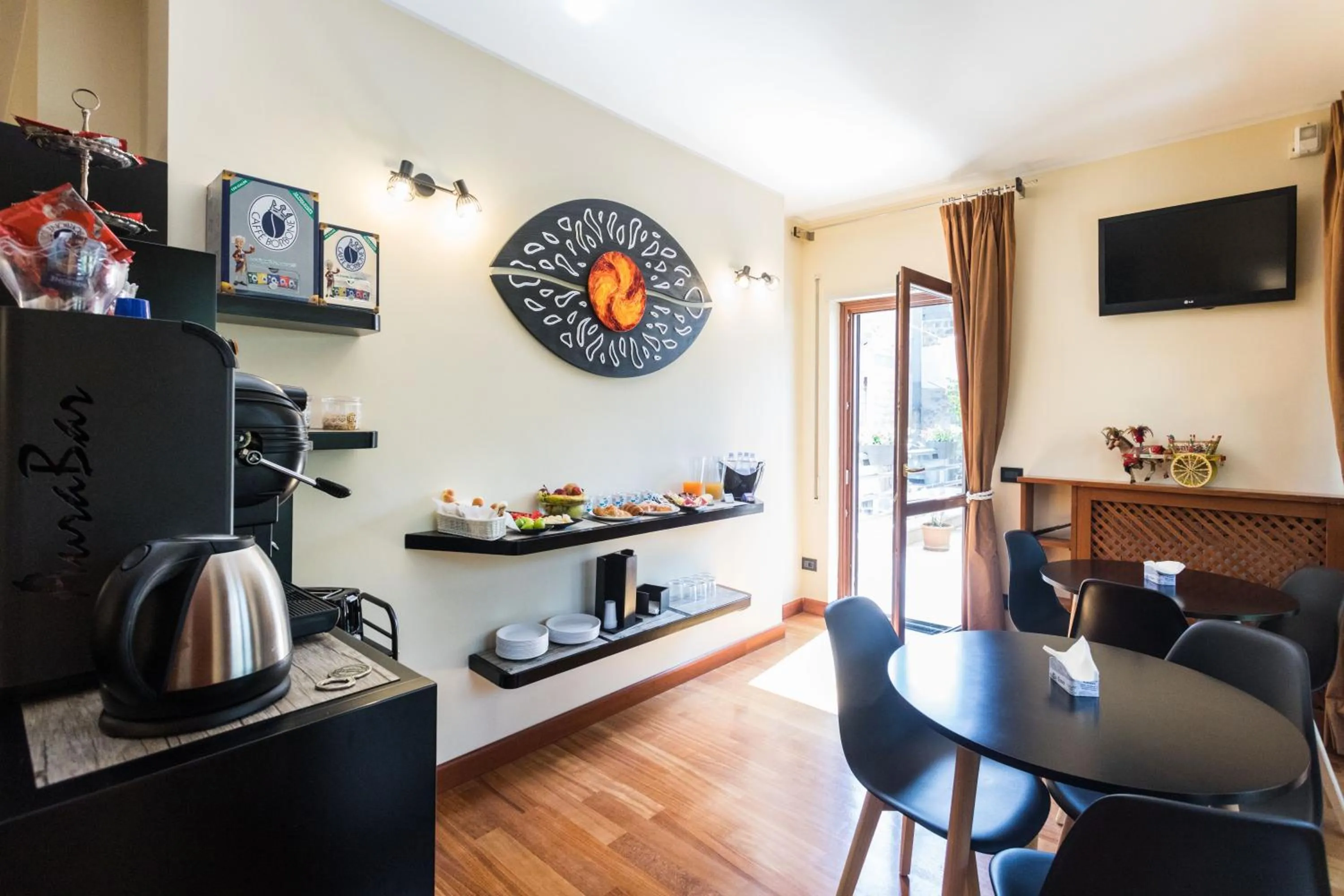 Communal lounge/ TV room in B&B TIFFANY SFERRACAVALLO