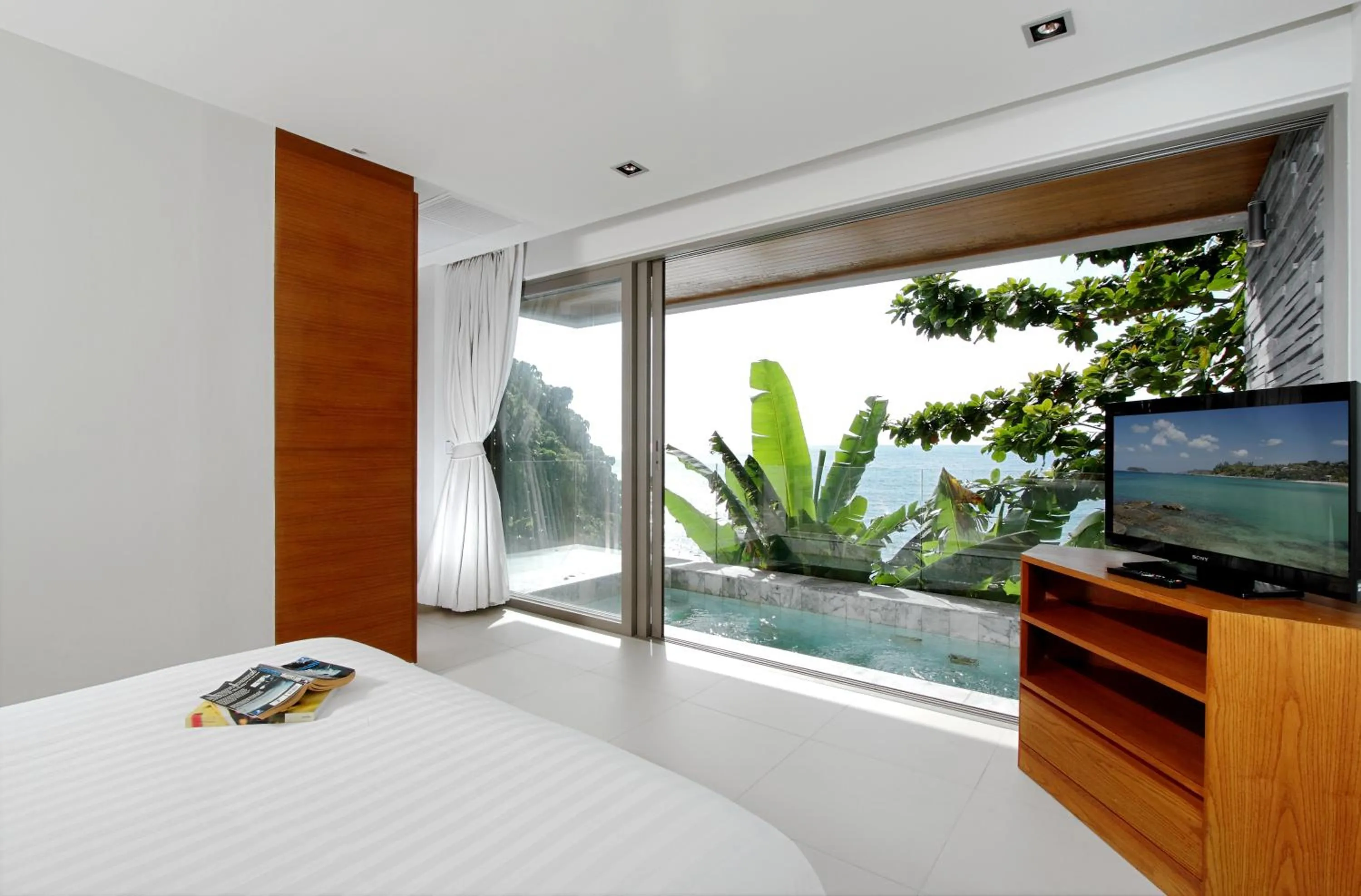 Bed in Cape Sienna Phuket Gourmet Hotel & Villas - SHA Extra Plus