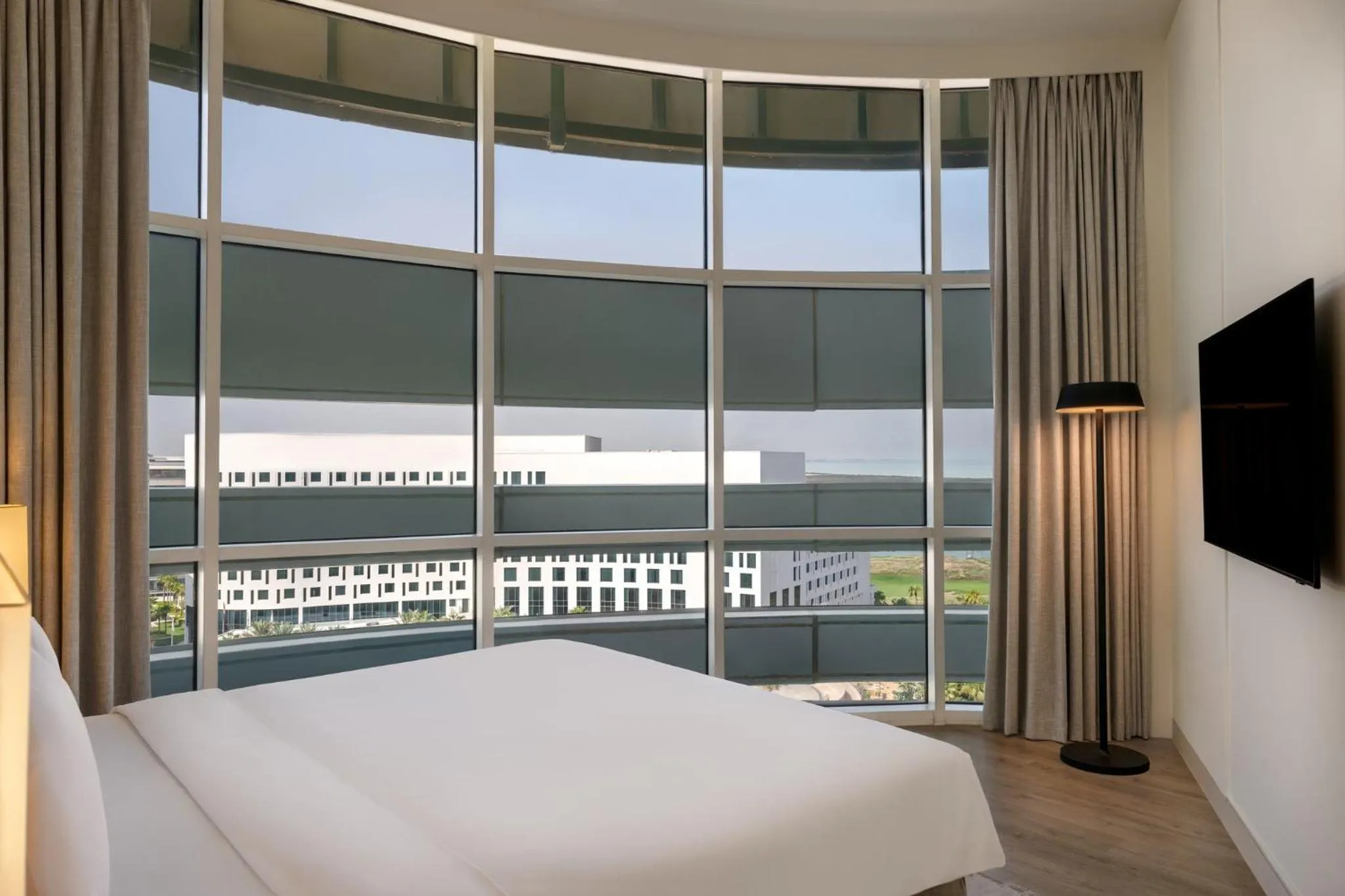 Photo of the whole room, Bed in Yas Plaza Marina by IHG