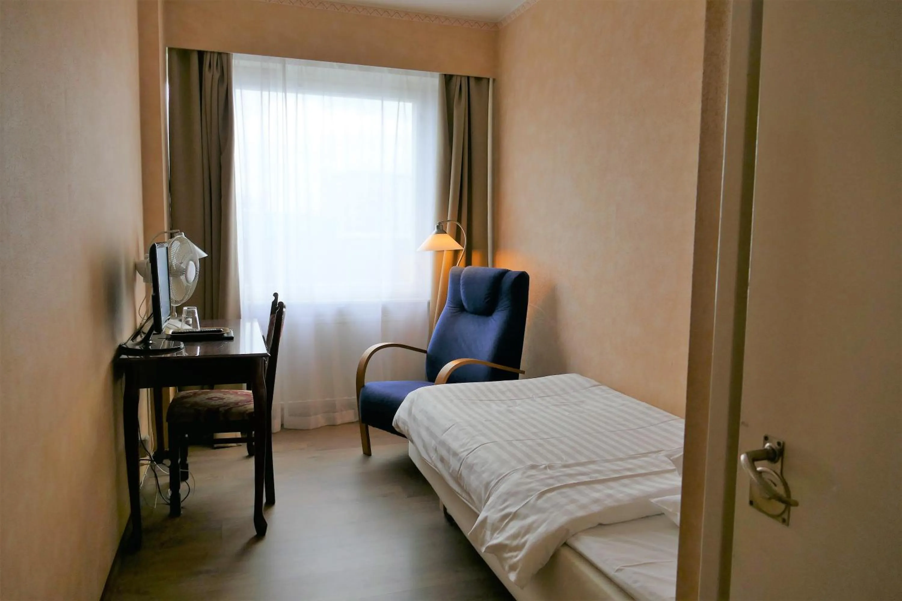 Bed in Linnanpiha Bed & Breakfast