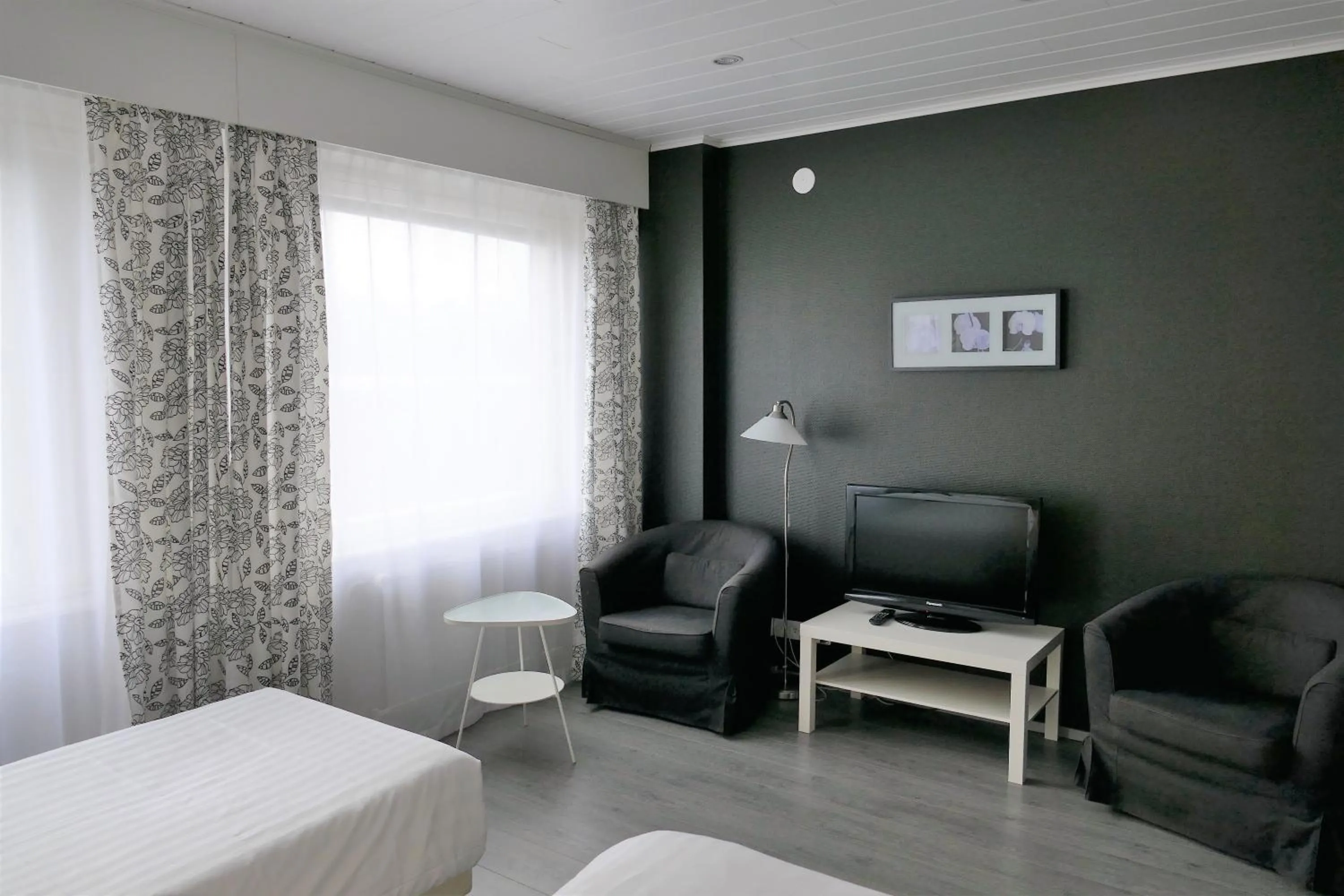 Bed in Linnanpiha Bed & Breakfast