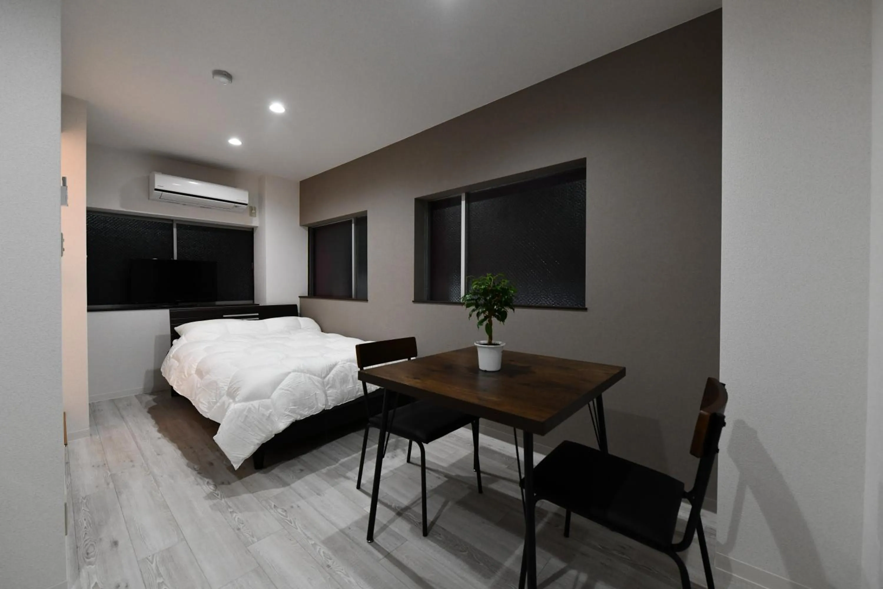 Bed in Suzumaru Hotel