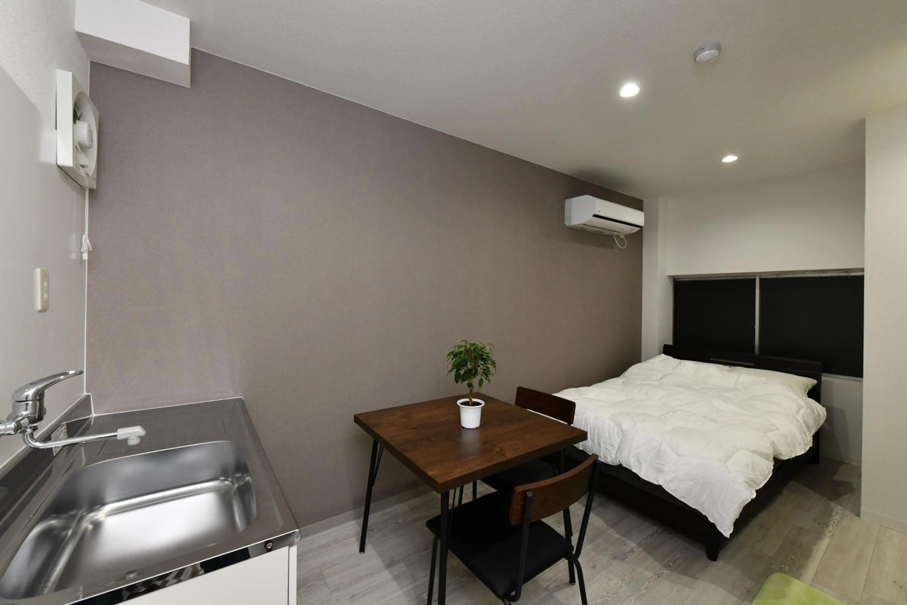 Bed in Suzumaru Hotel