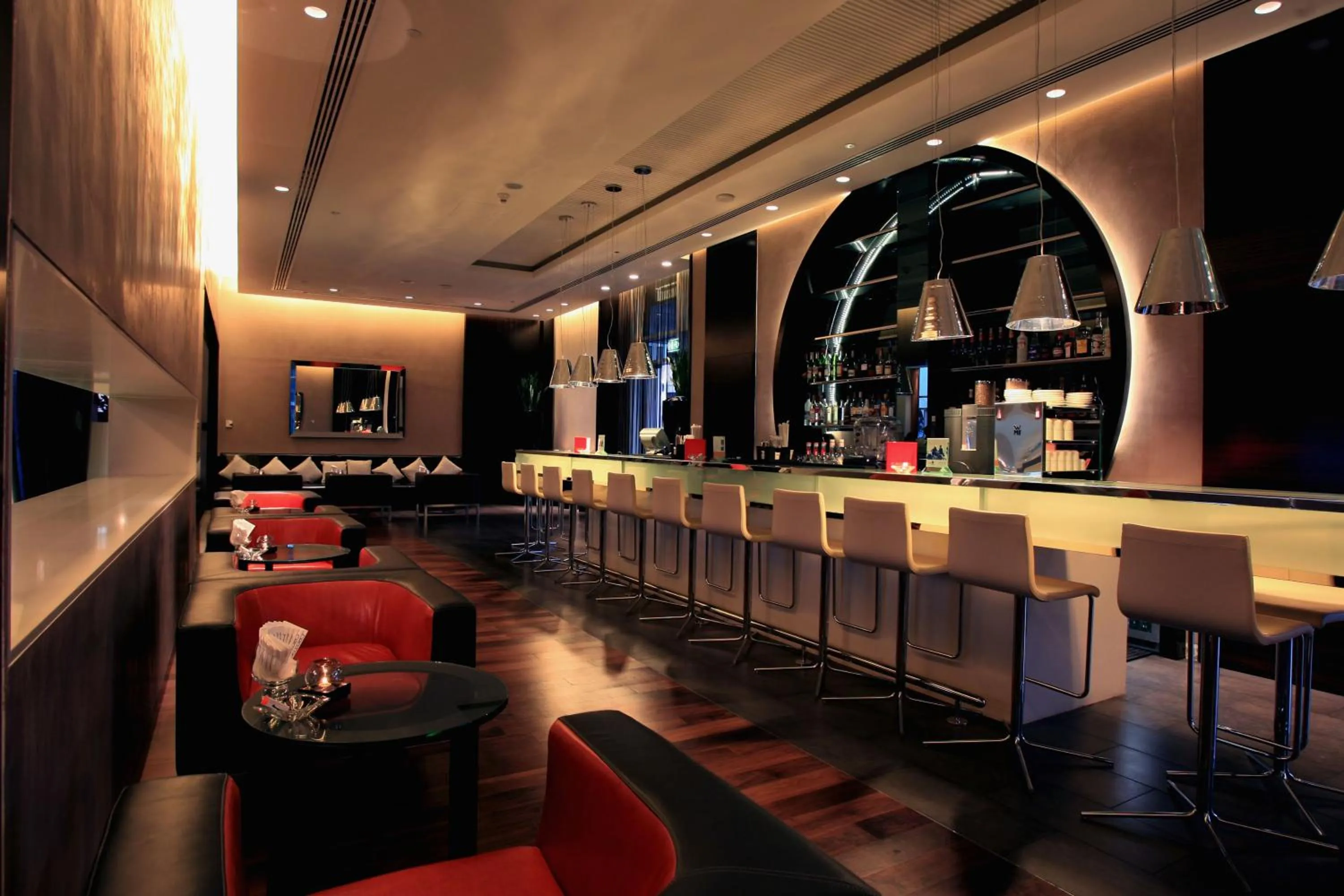 Lounge or bar in Yas Plaza Circuit by IHG