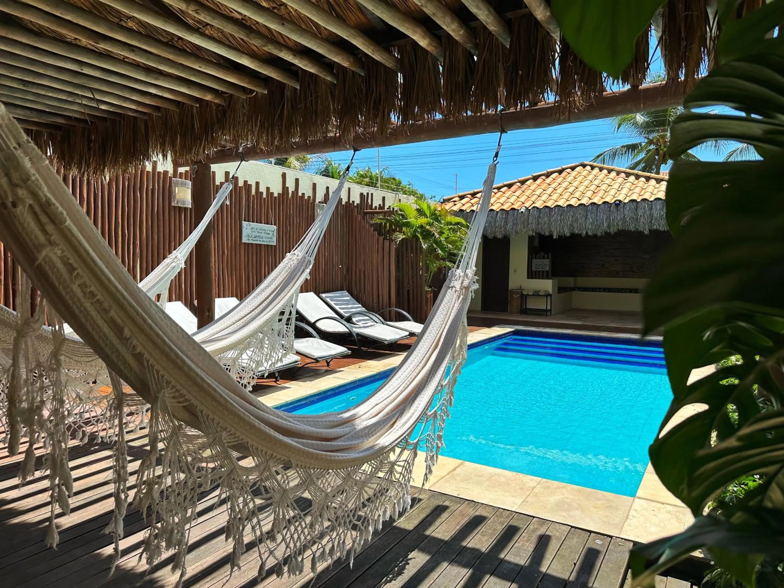 Swimming pool in Pousada Oasis Paracuru