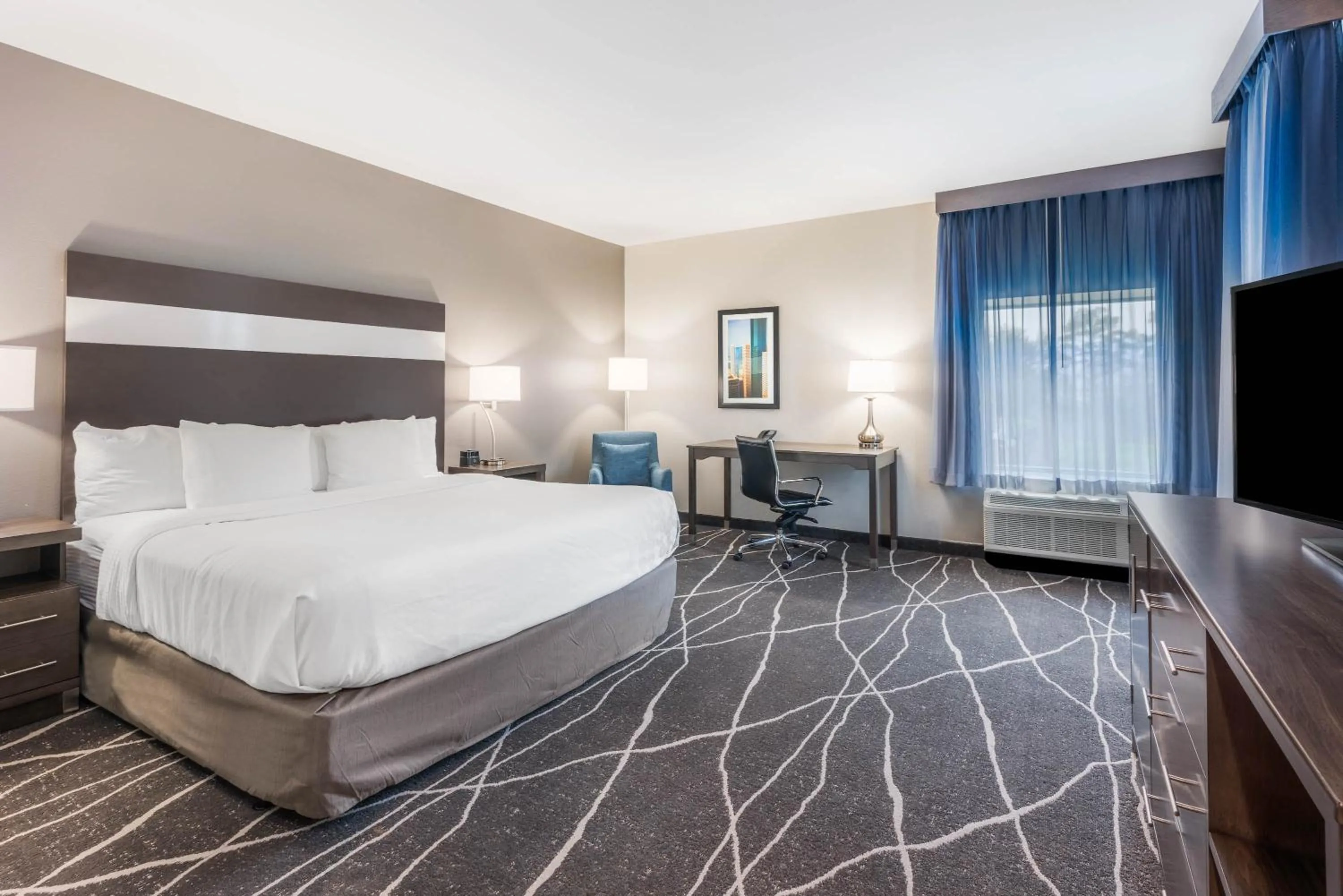 Bedroom, Bed in La Quinta Inn and Suites by Wyndham Houston Spring South