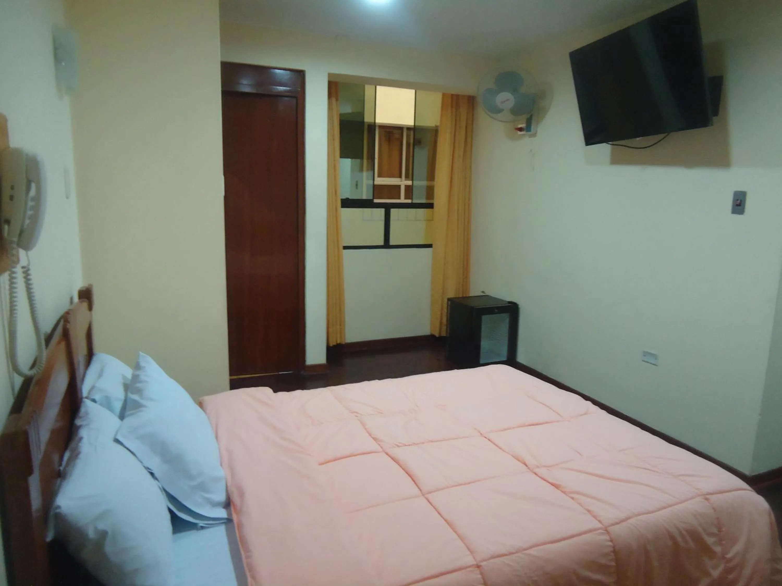 Bed in Hotel Panamericano