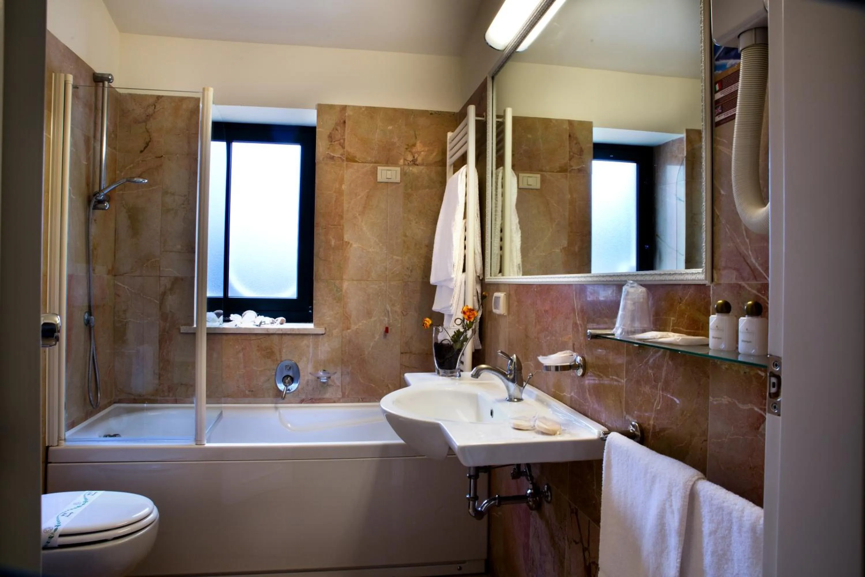 Bathroom in Delfino Beach Hotel