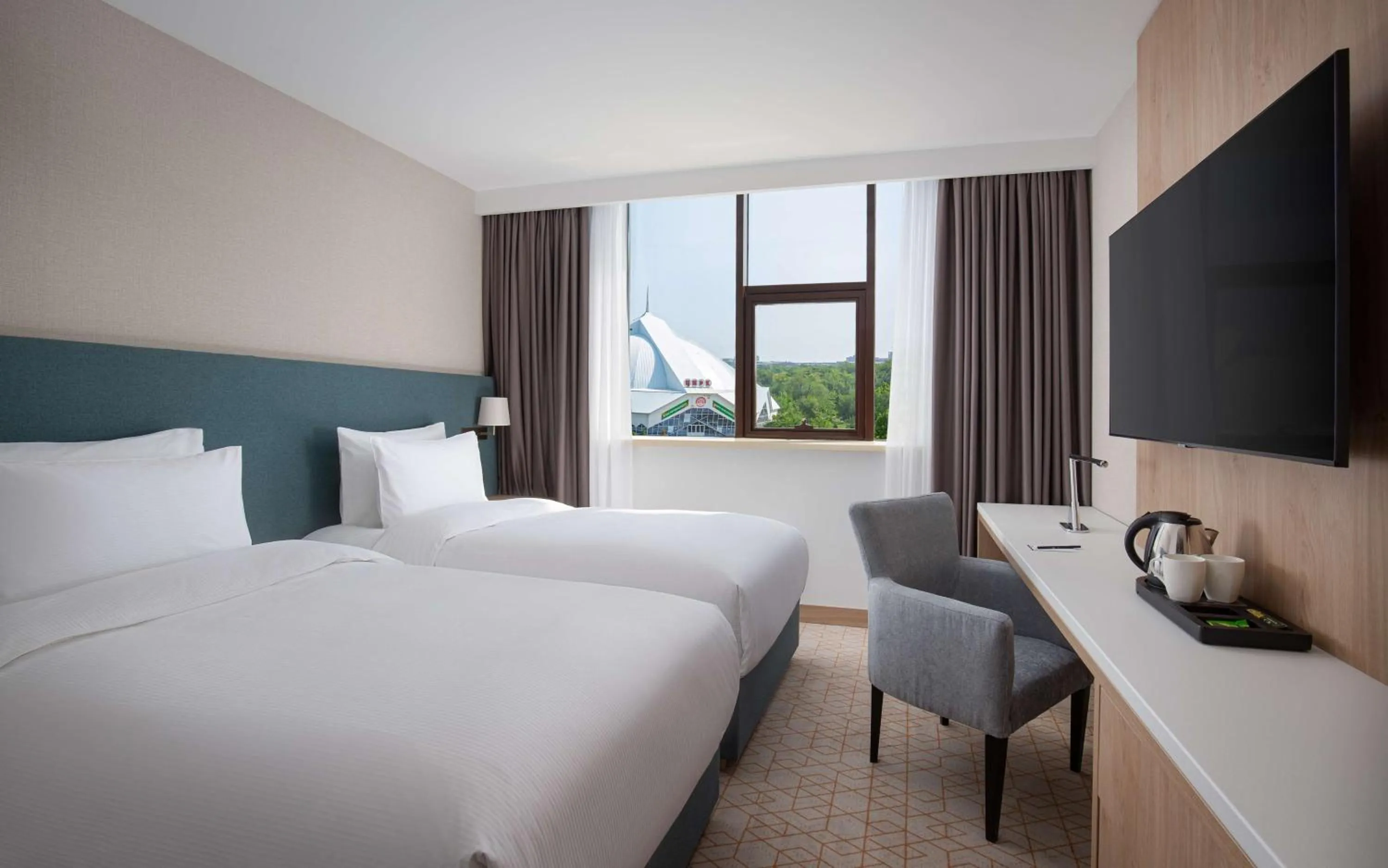 Bedroom, Bed in DoubleTree by Hilton Shymkent