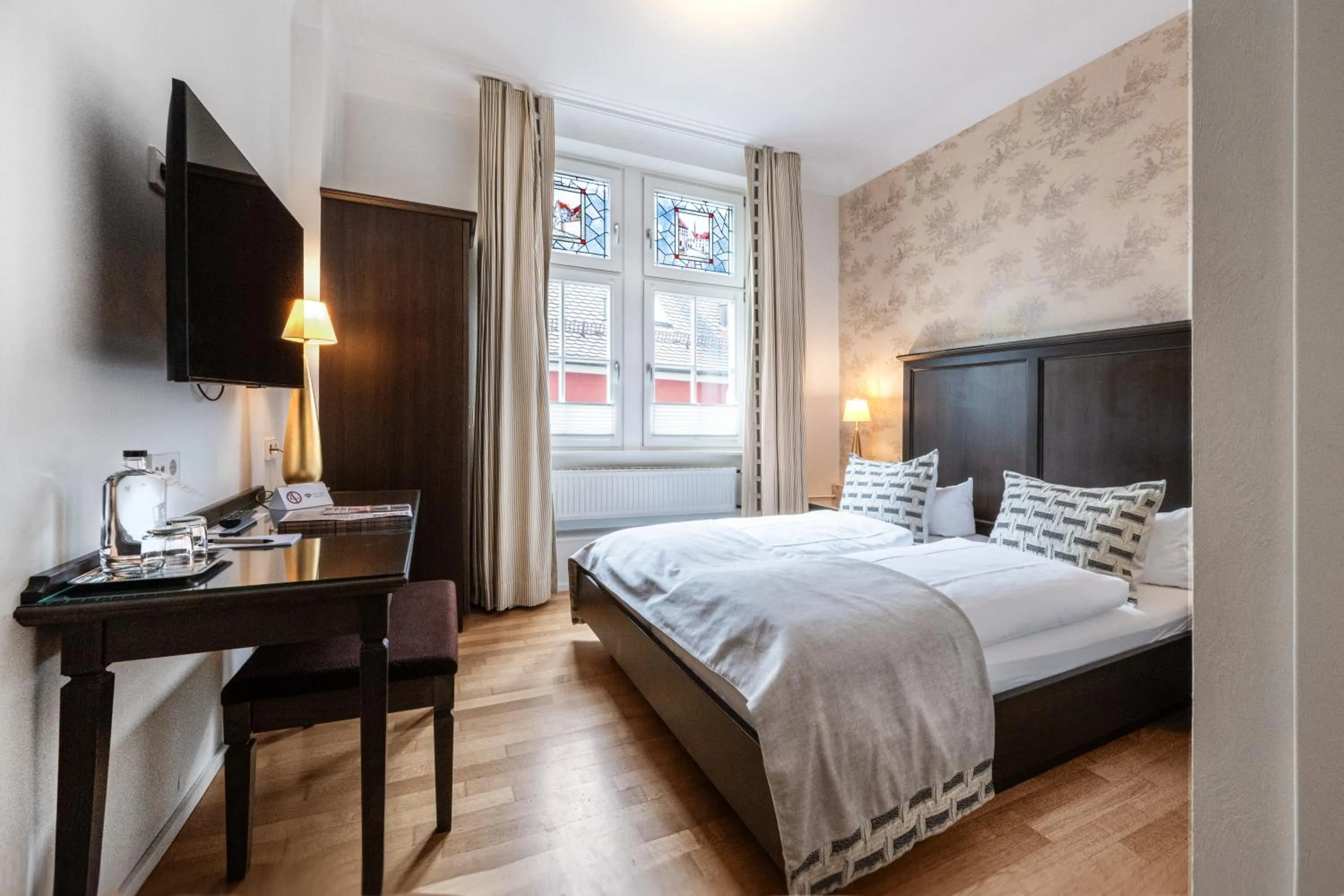 Photo of the whole room, Bed in Romantik Hotel Barbarossa