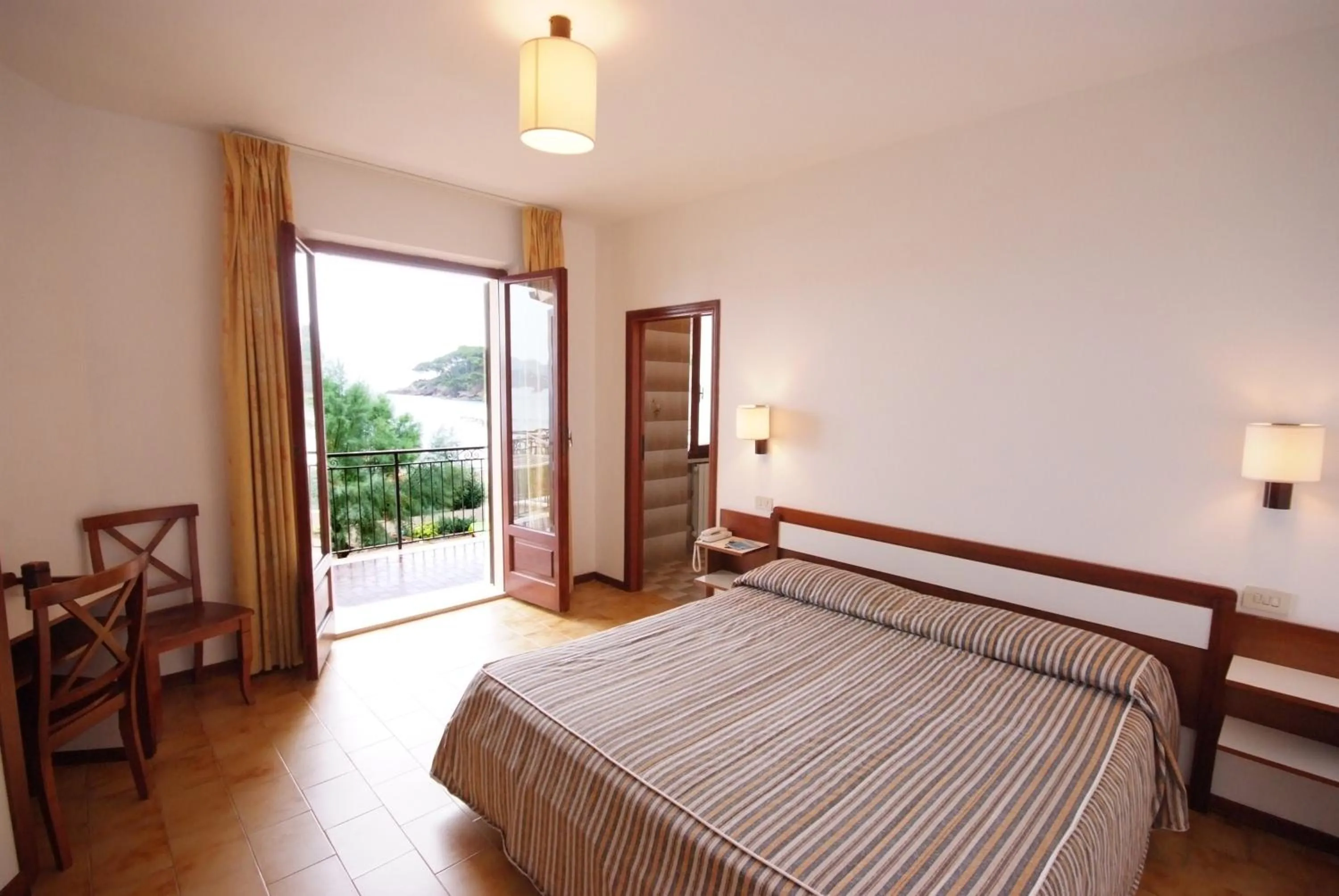 Bed in Hotel Voce del Mare