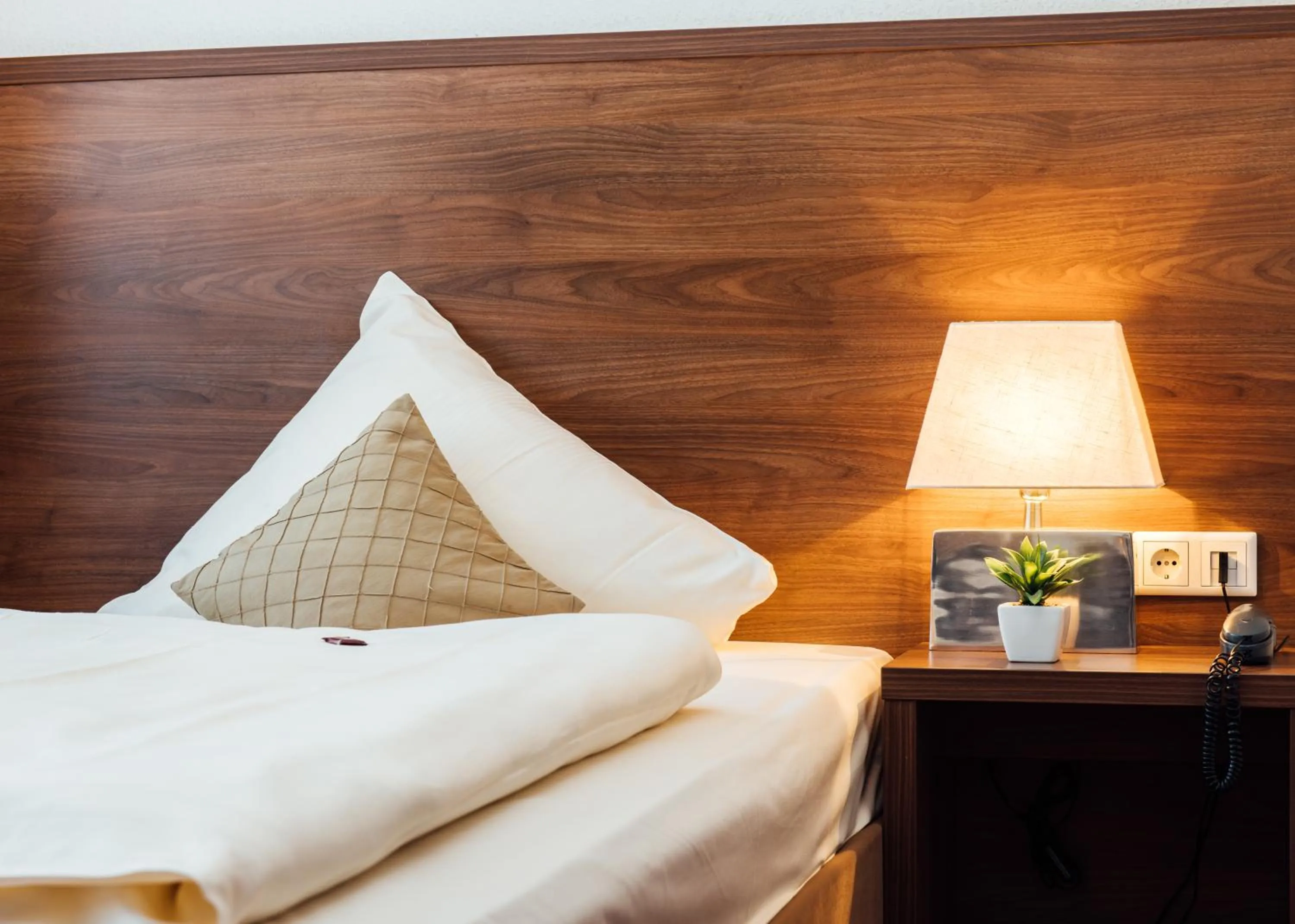 Decorative detail, Bed in Arcade Hotel