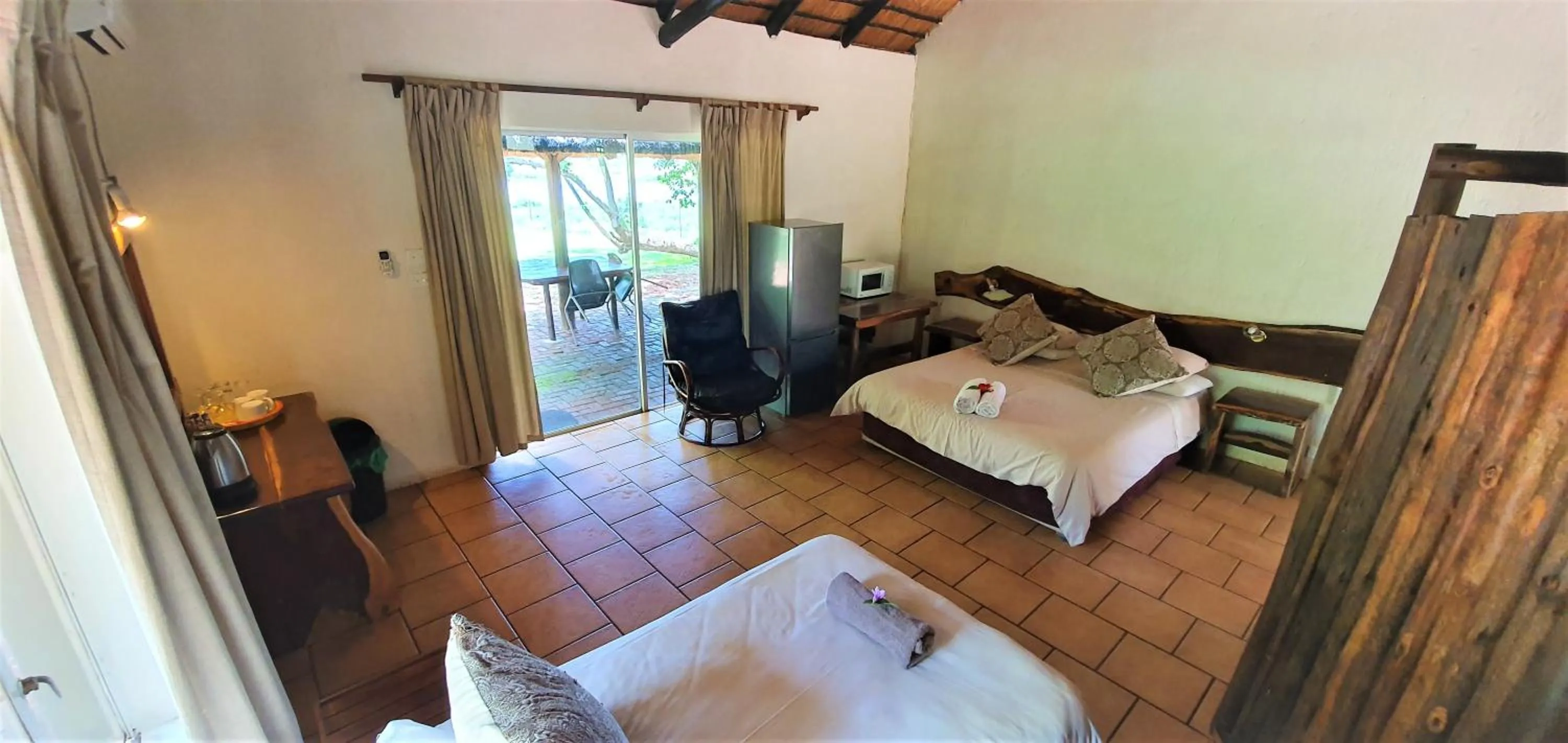 Photo of the whole room, Bed in Elephant Walk Retreat