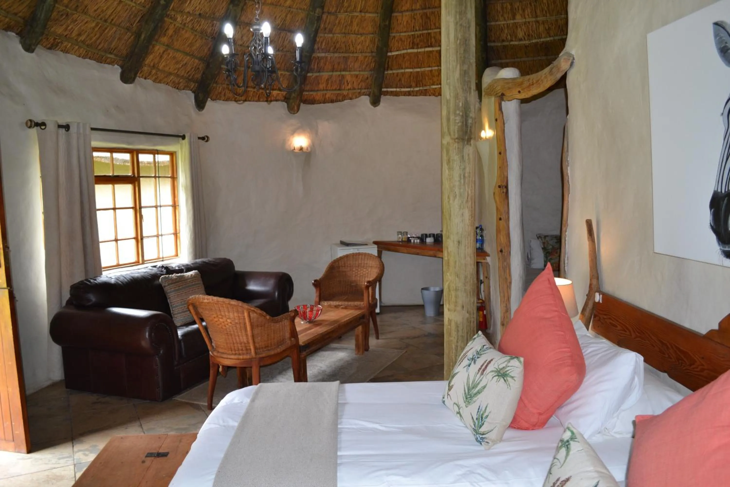 Seating area, Bed in Chrislin African Lodge