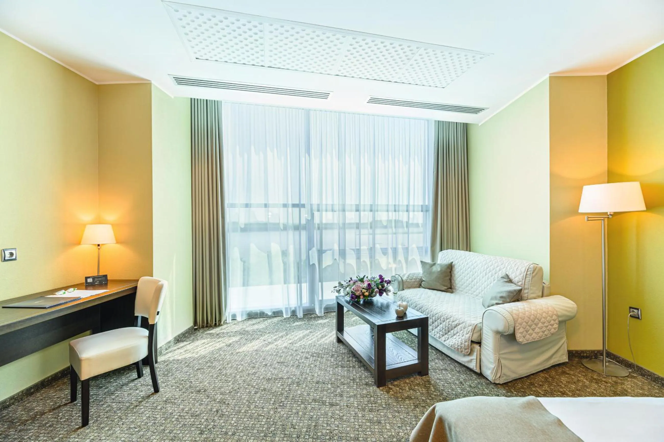 Seating area, Bed in Vega Hotel