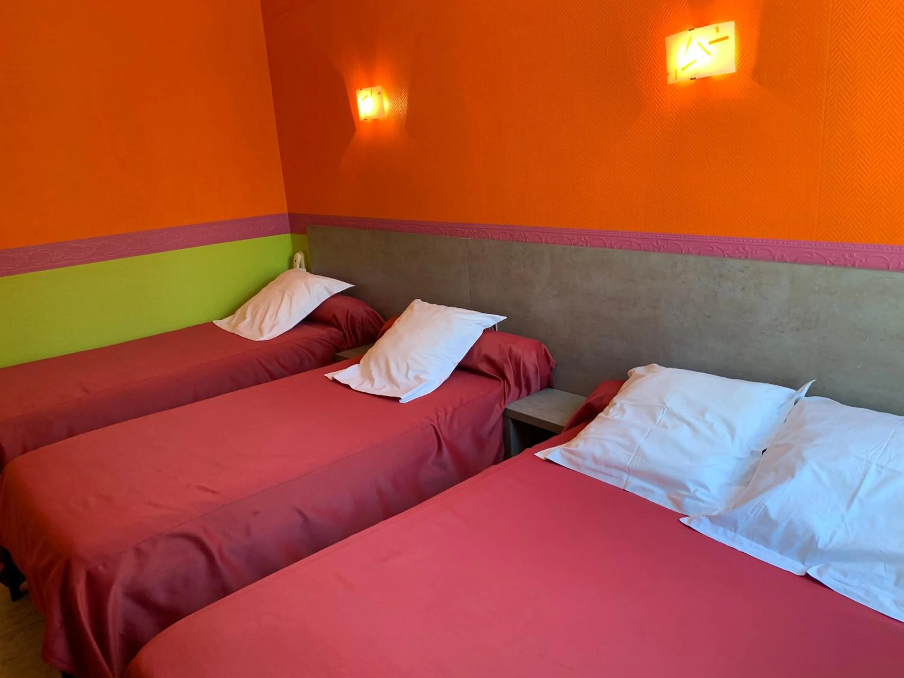 Bed in Hotel des voyageurs Chez Betty