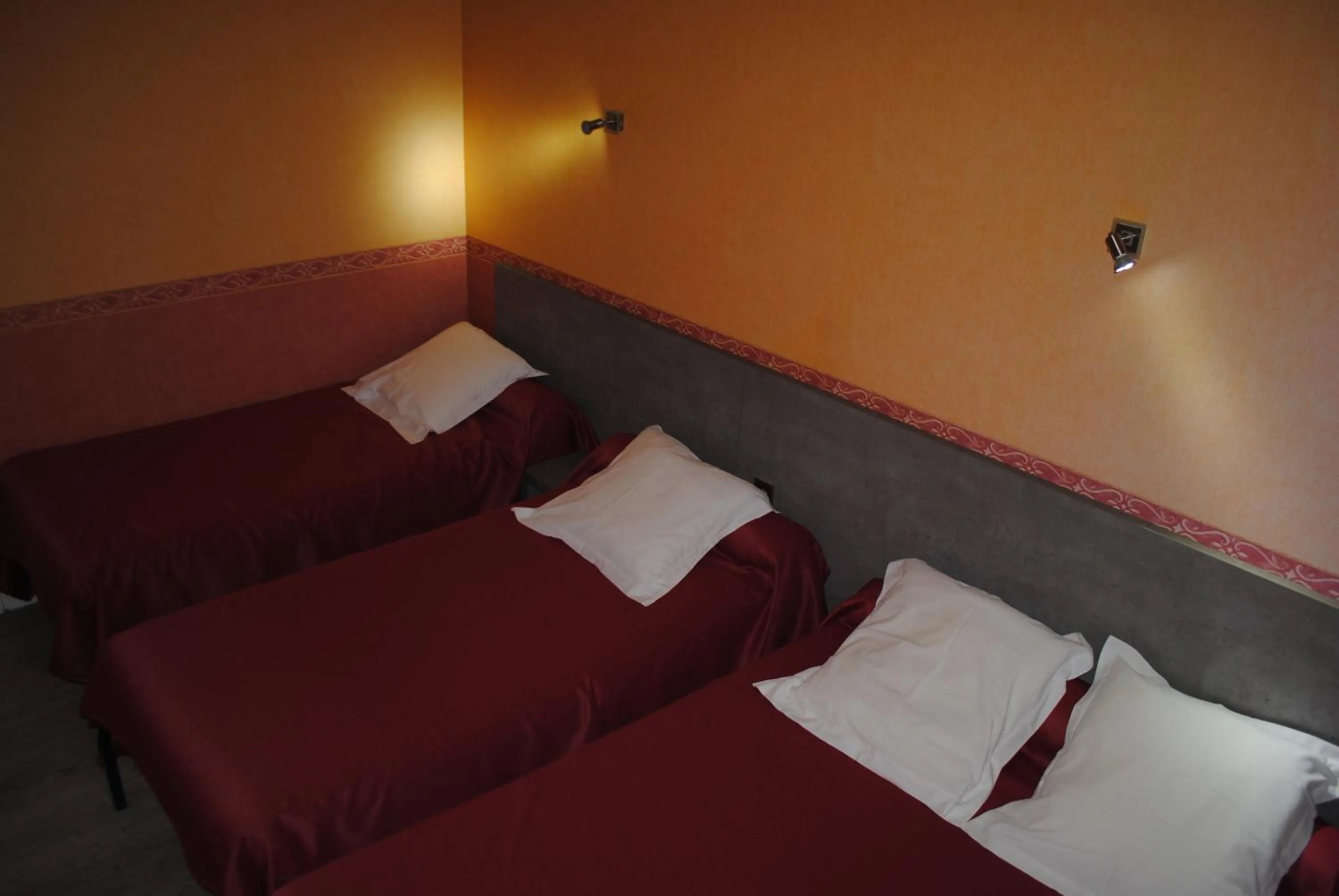 Bed in Hotel des voyageurs Chez Betty