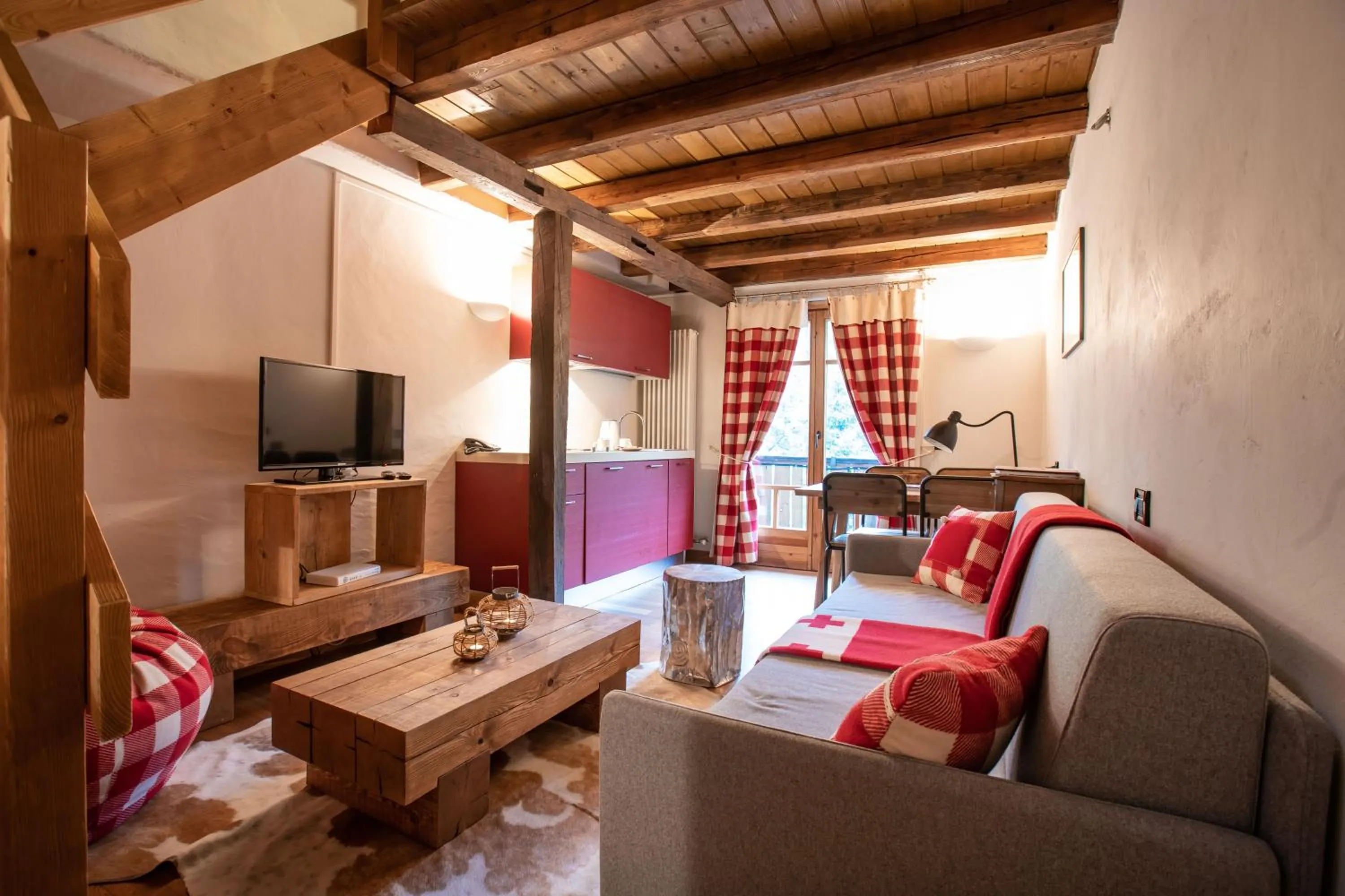 Communal lounge/ TV room in Chalet Svizzero