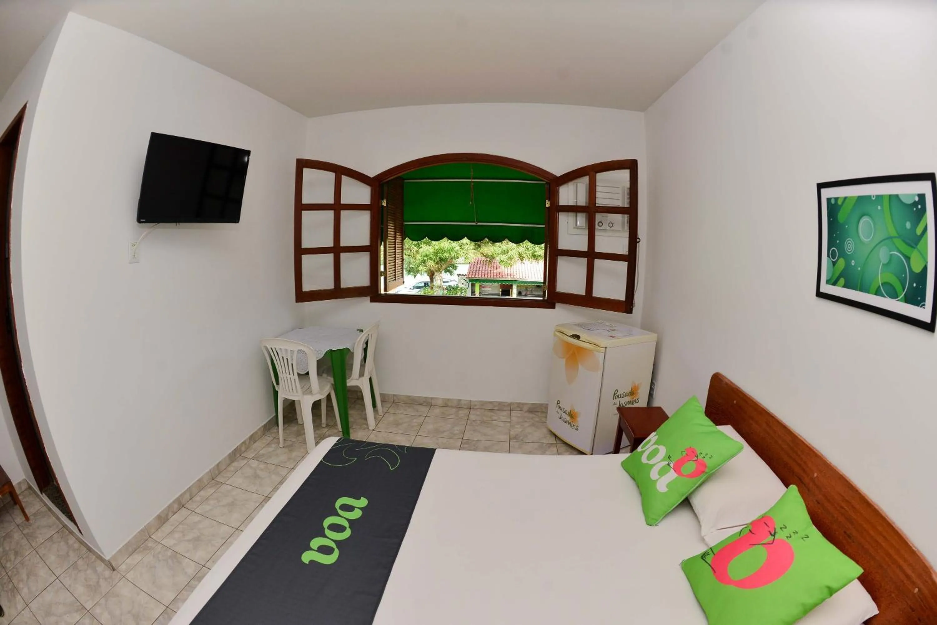 Bed in VOA Pousada Dos Jasmins