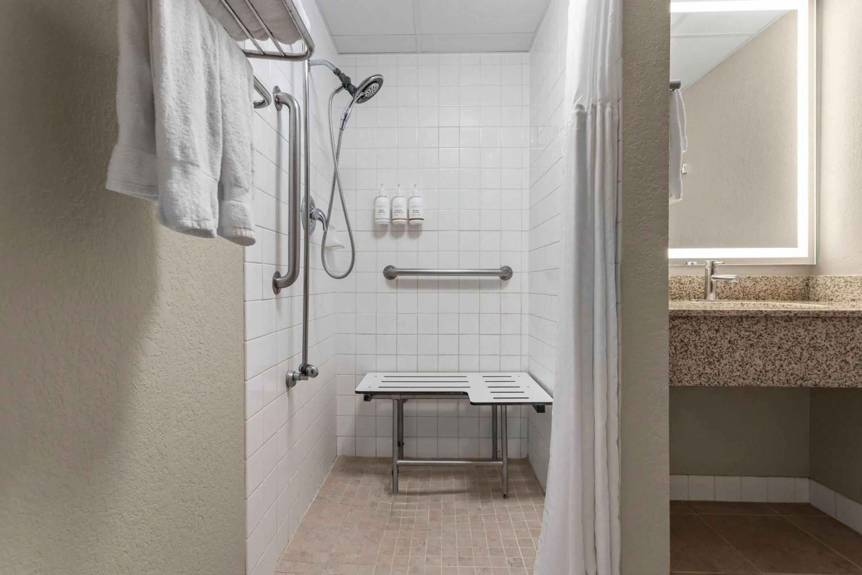 Shower in AmericInn by Wyndham Roseau