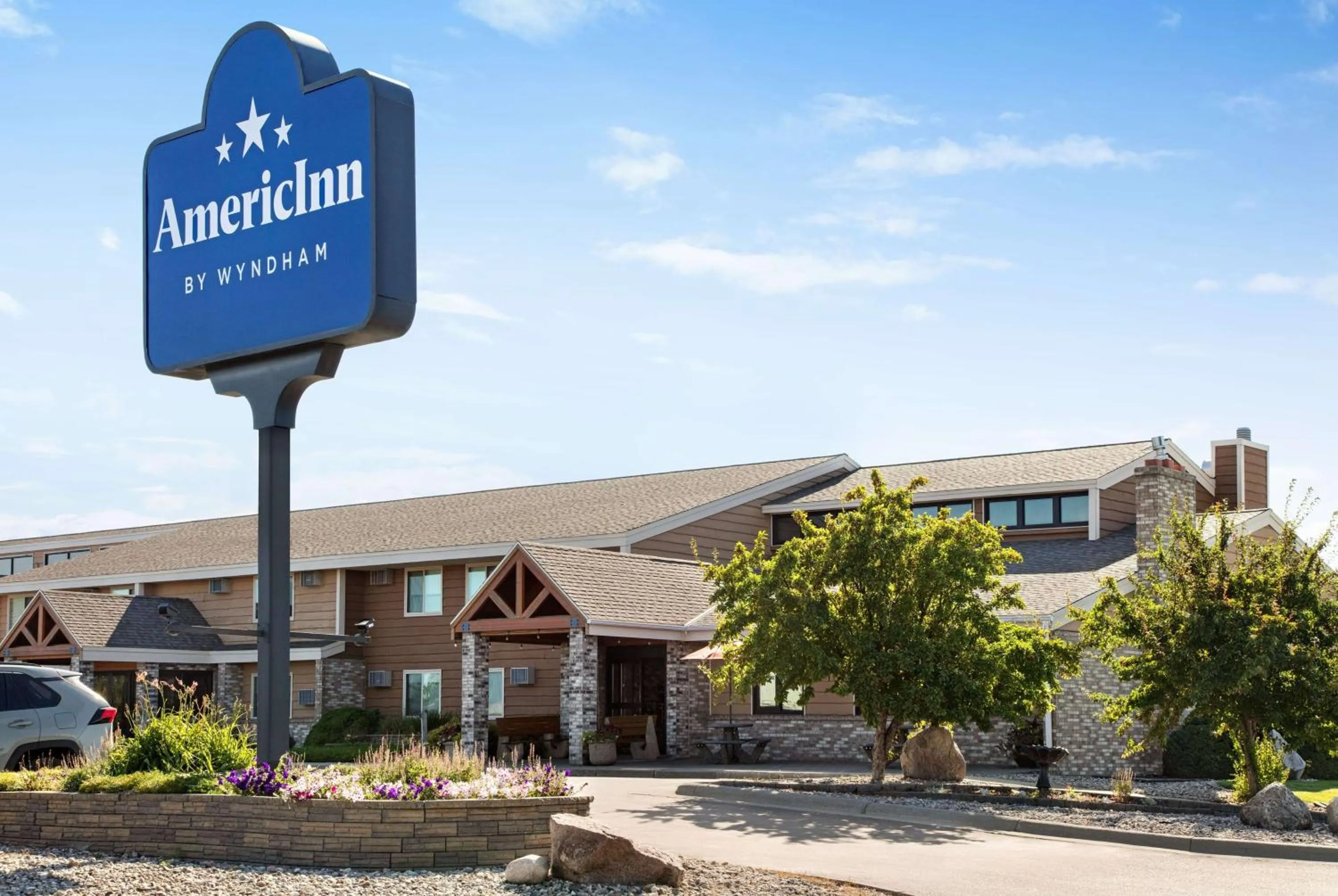 Property building in AmericInn by Wyndham Roseau