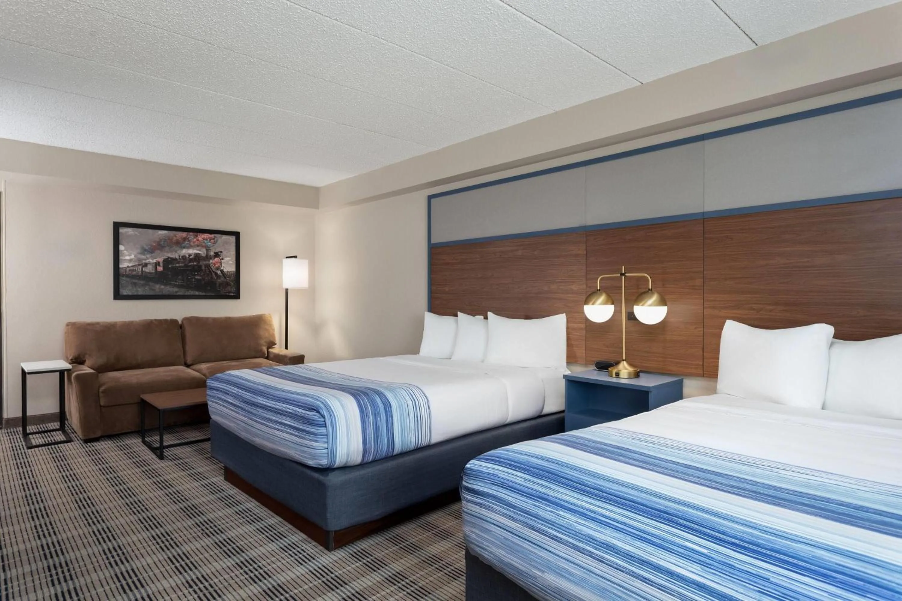 Photo of the whole room, Bed in AmericInn by Wyndham Roseau