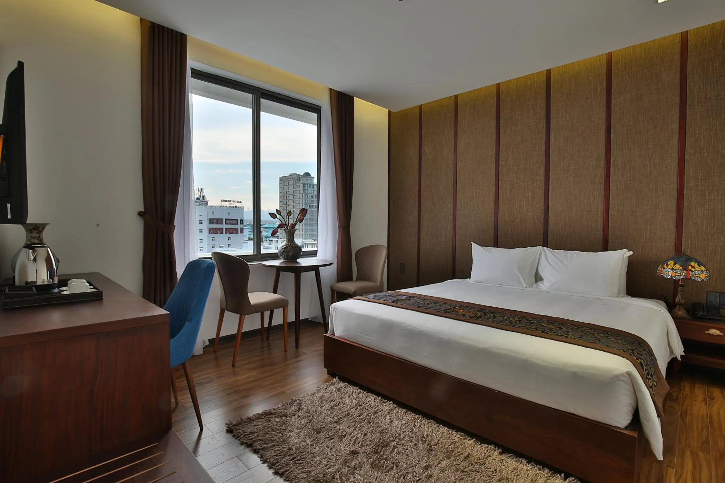 Photo of the whole room, Bed in Dong Duong Hotel & Suites - City Central - Afternoon Tea Inclusive