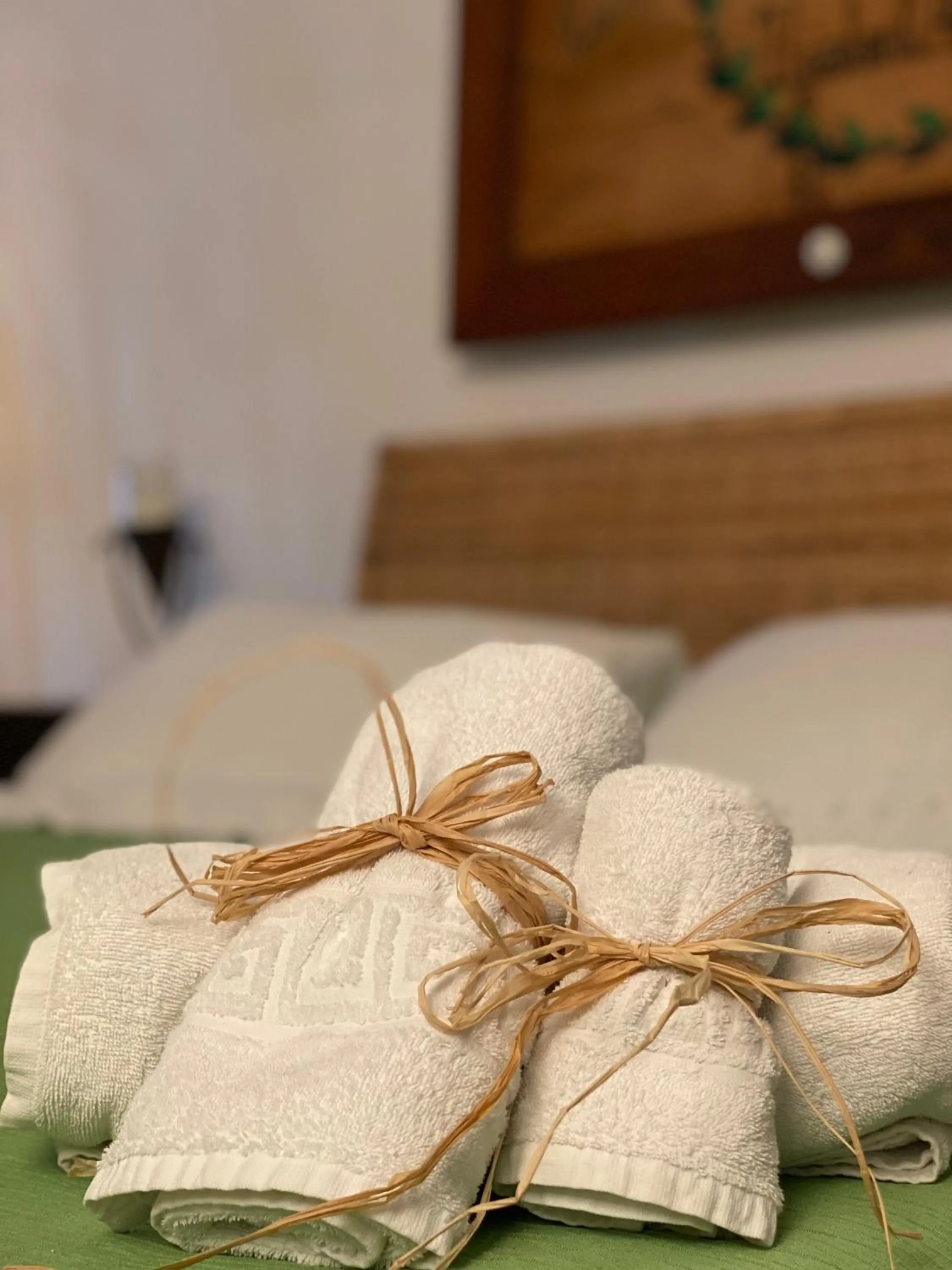 towels, Bed in B&B Il giardino di Armida