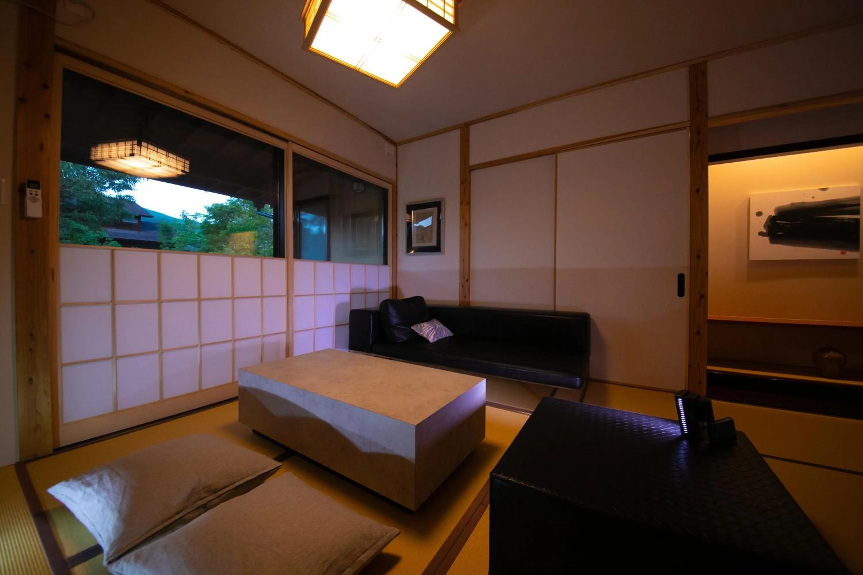 Living room, Bed in Oyado Den Rikyu