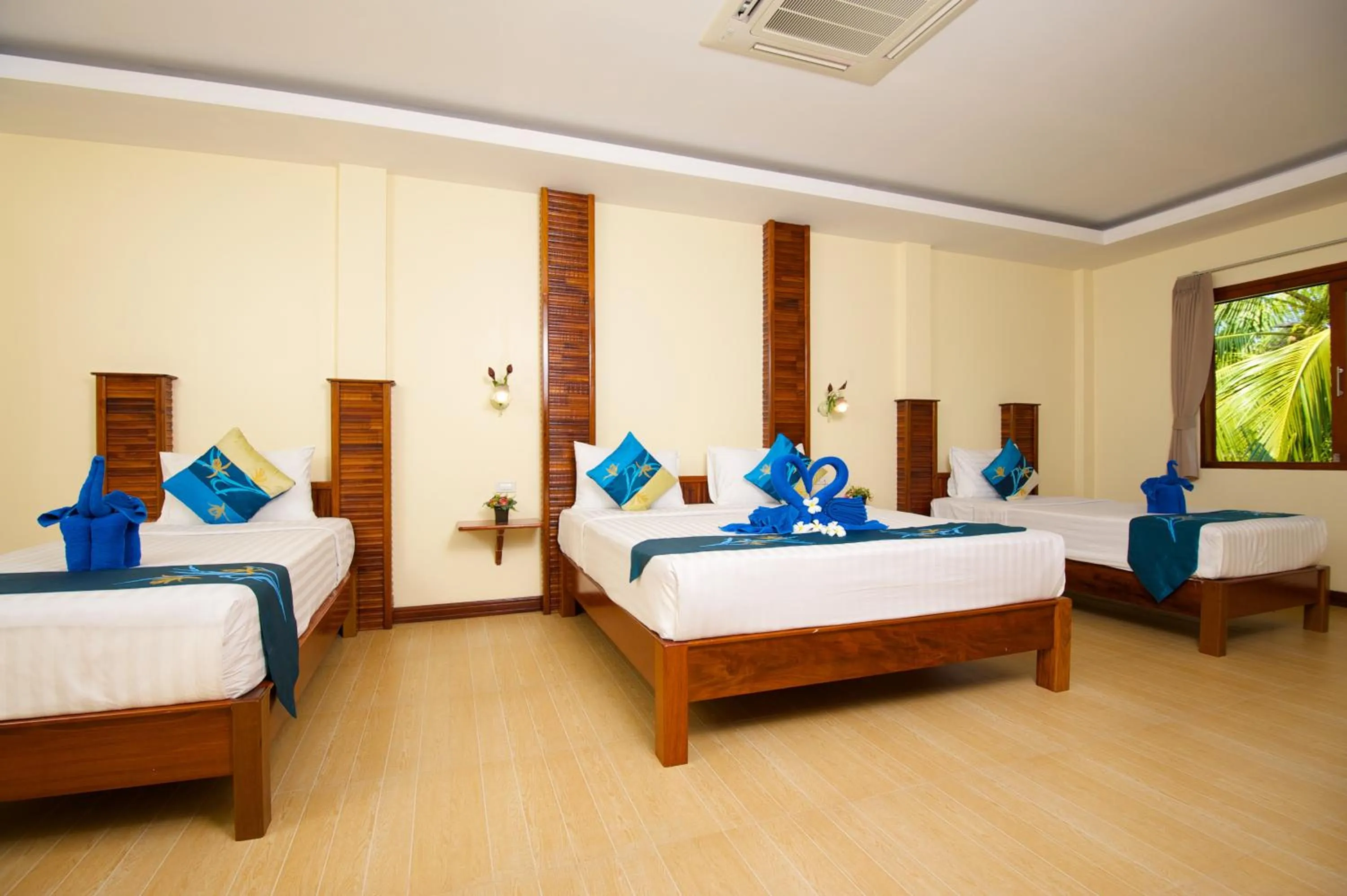 Photo of the whole room, Bed in Wind Beach Resort