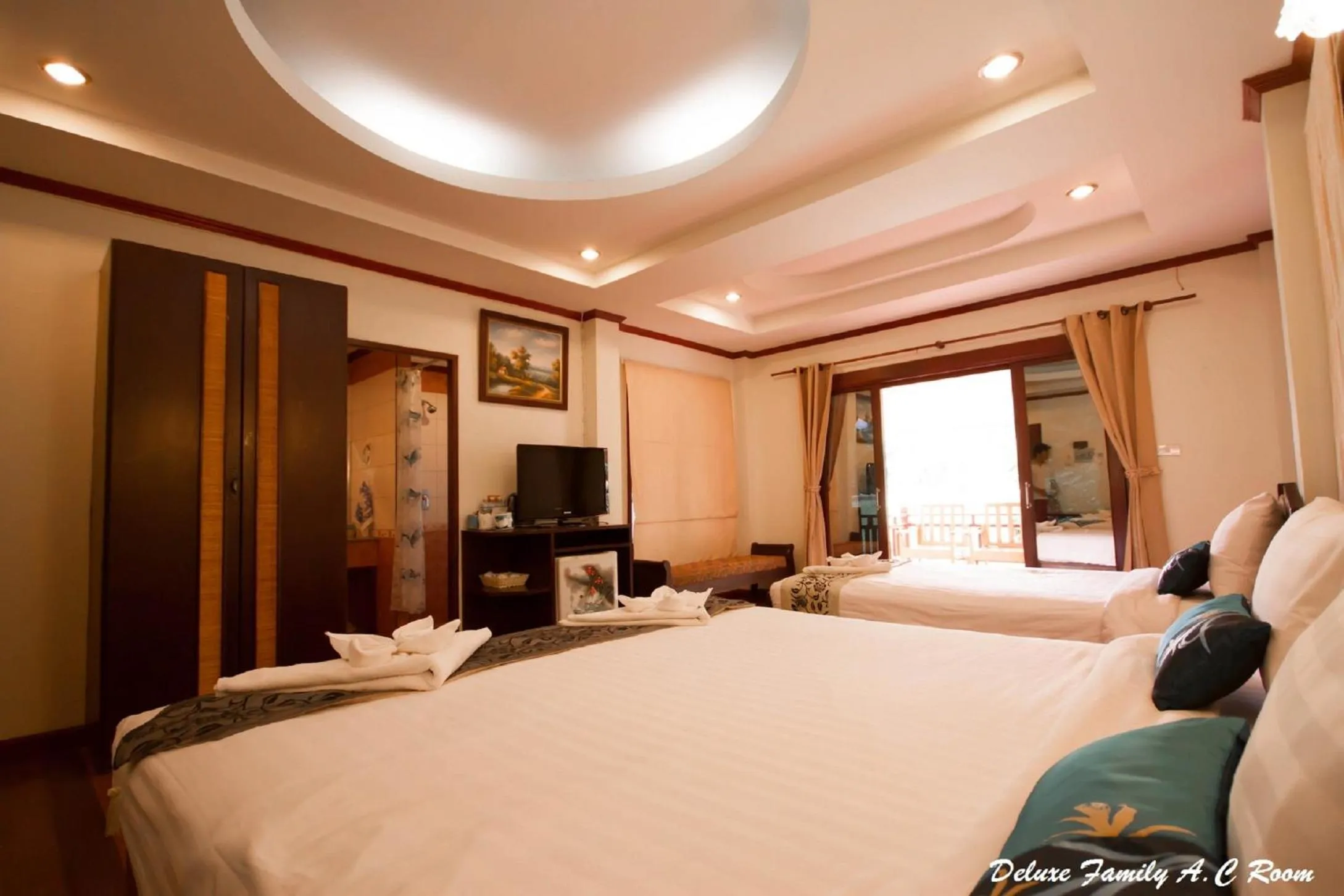 Photo of the whole room, Bed in Wind Beach Resort