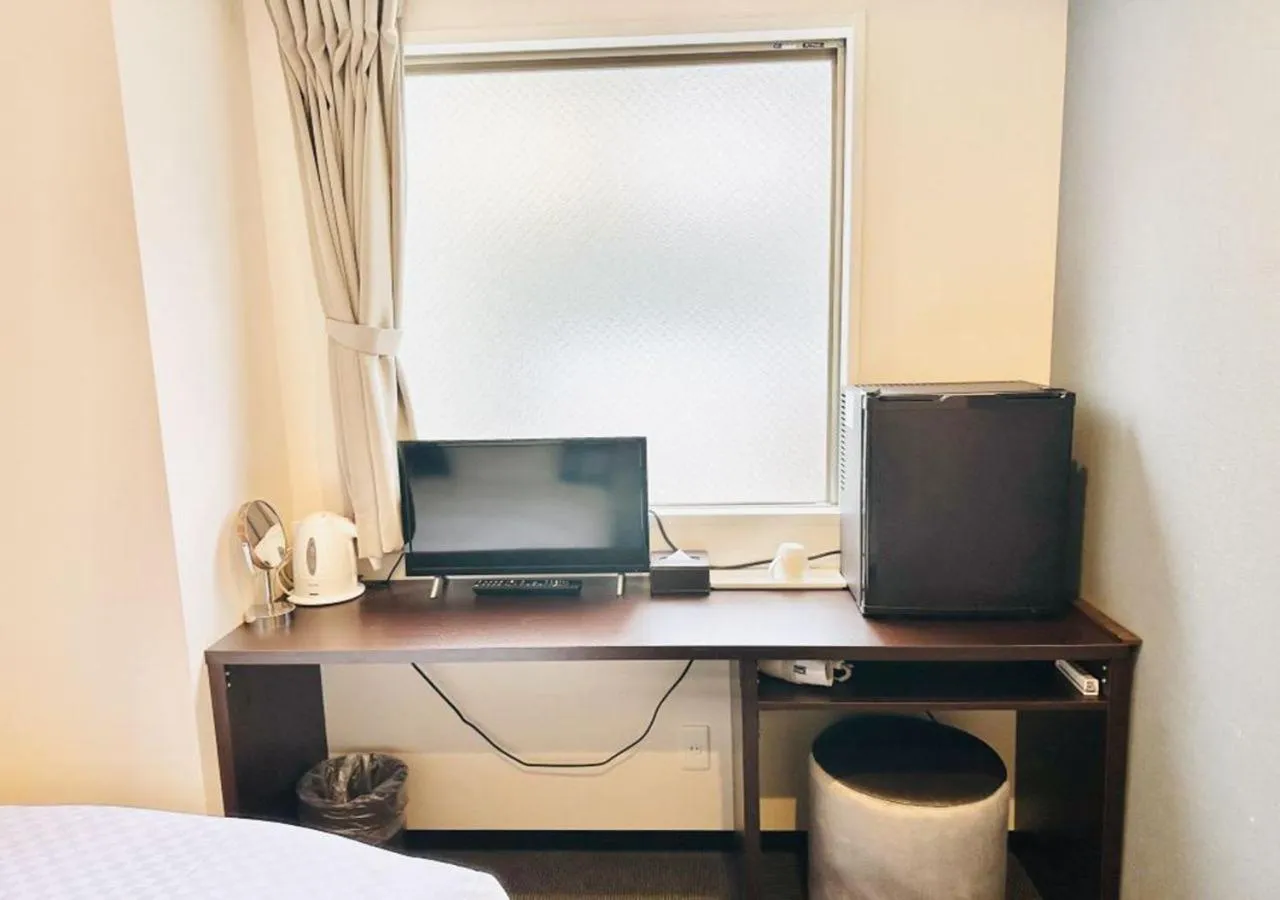 Communal lounge/ TV room, Bed in Floral Hotel · SakaisuJi-Honmachi Osaka