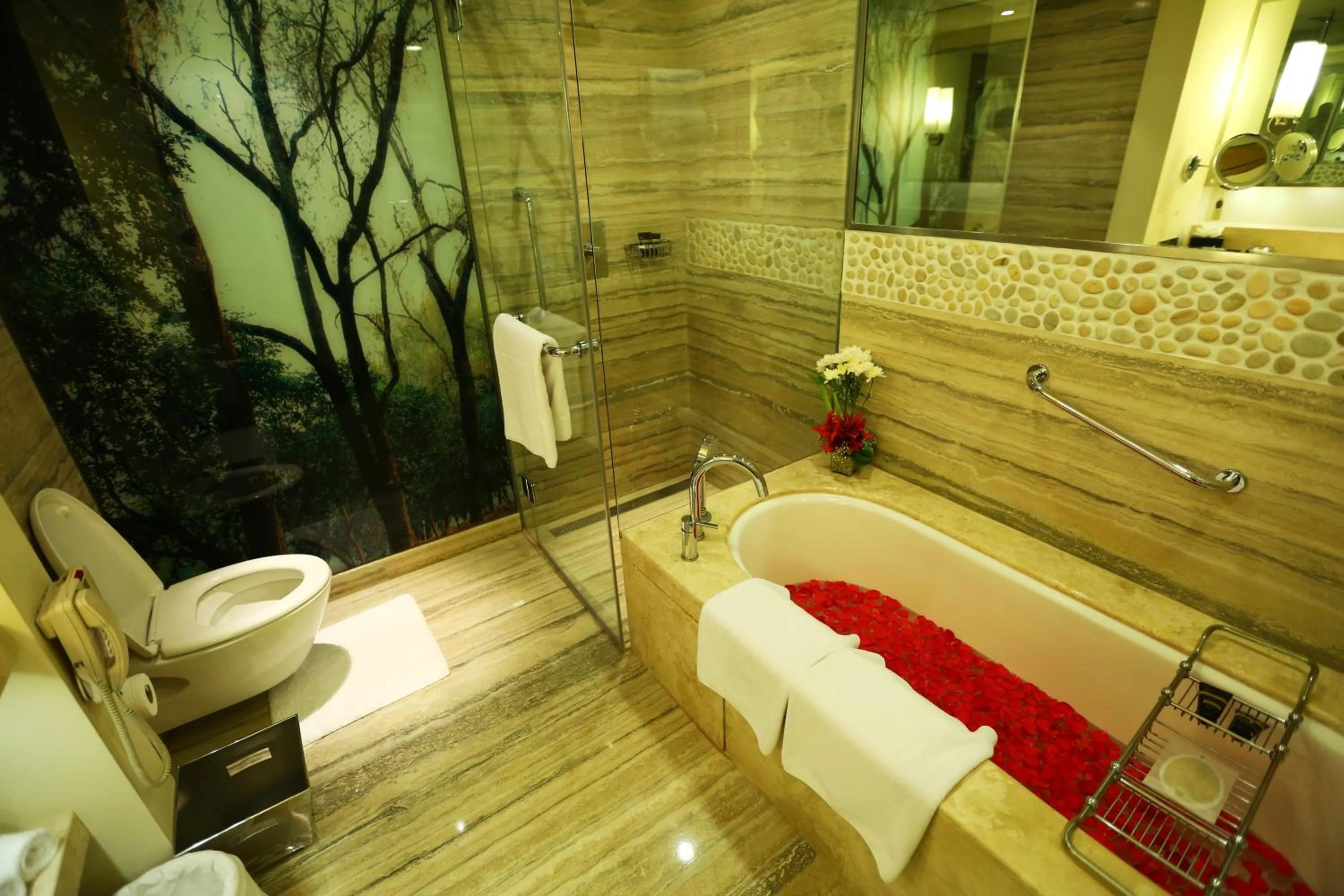 Shower in ITC Gardenia, a Luxury Collection Hotel, Bengaluru