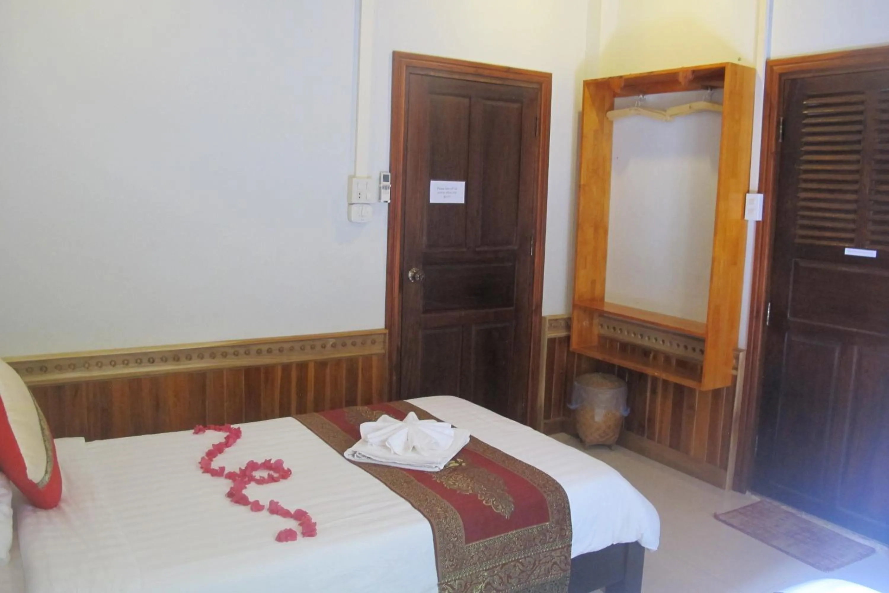 Photo of the whole room, Bed in Golden Lotus Place