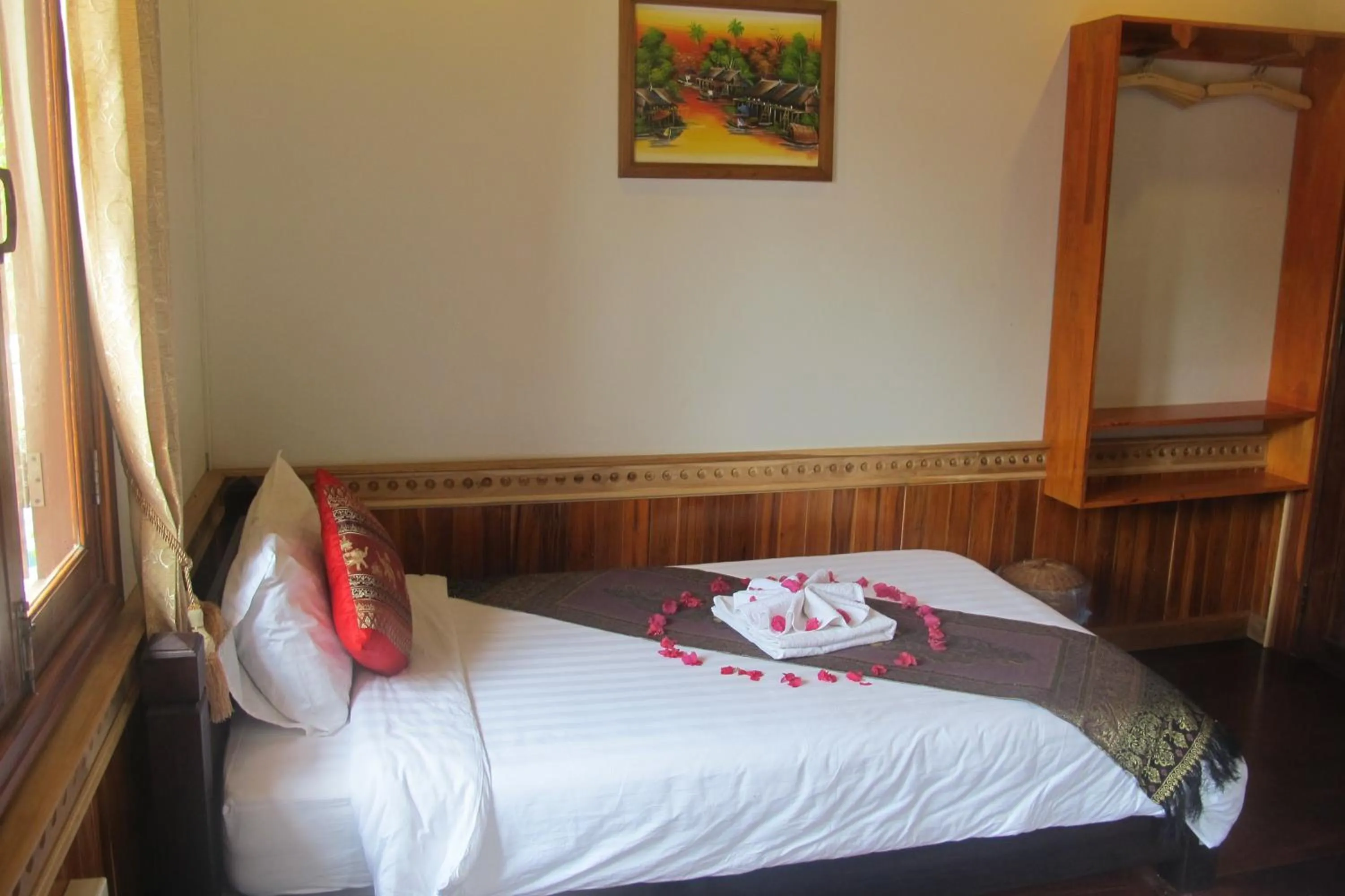 Photo of the whole room, Bed in Golden Lotus Place