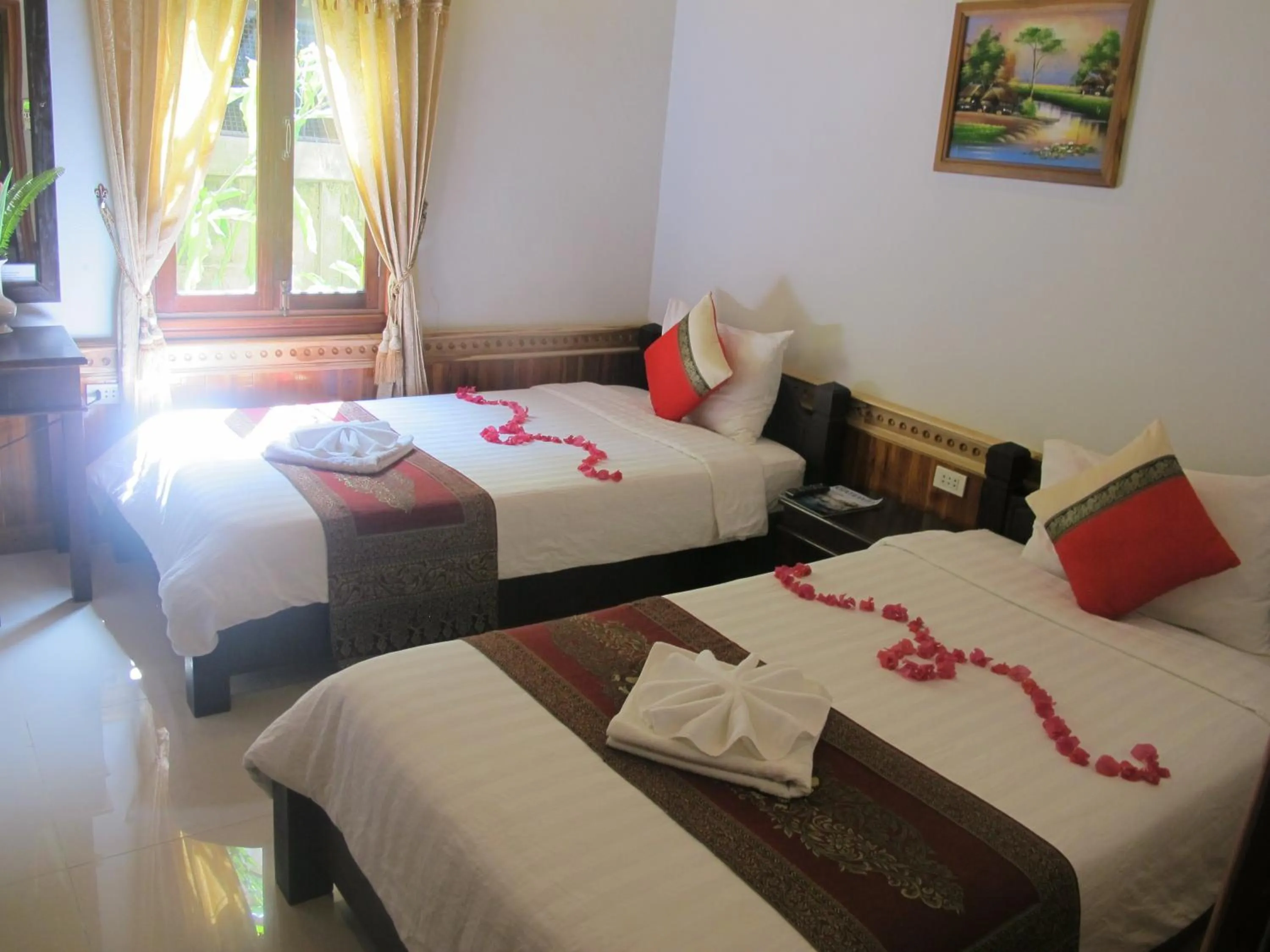 Photo of the whole room, Bed in Golden Lotus Place