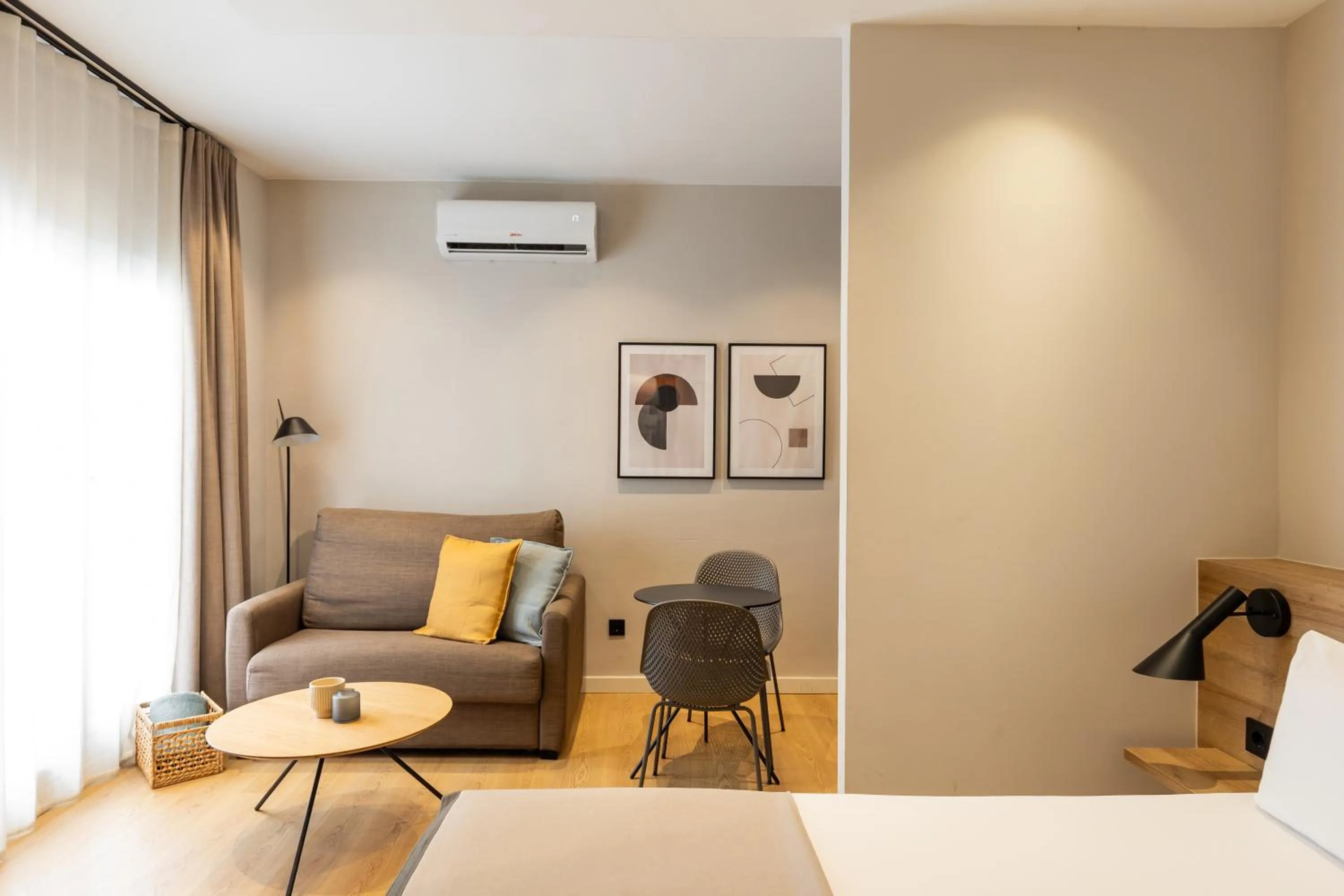 Living room, Bed in Apartamentos Laforja