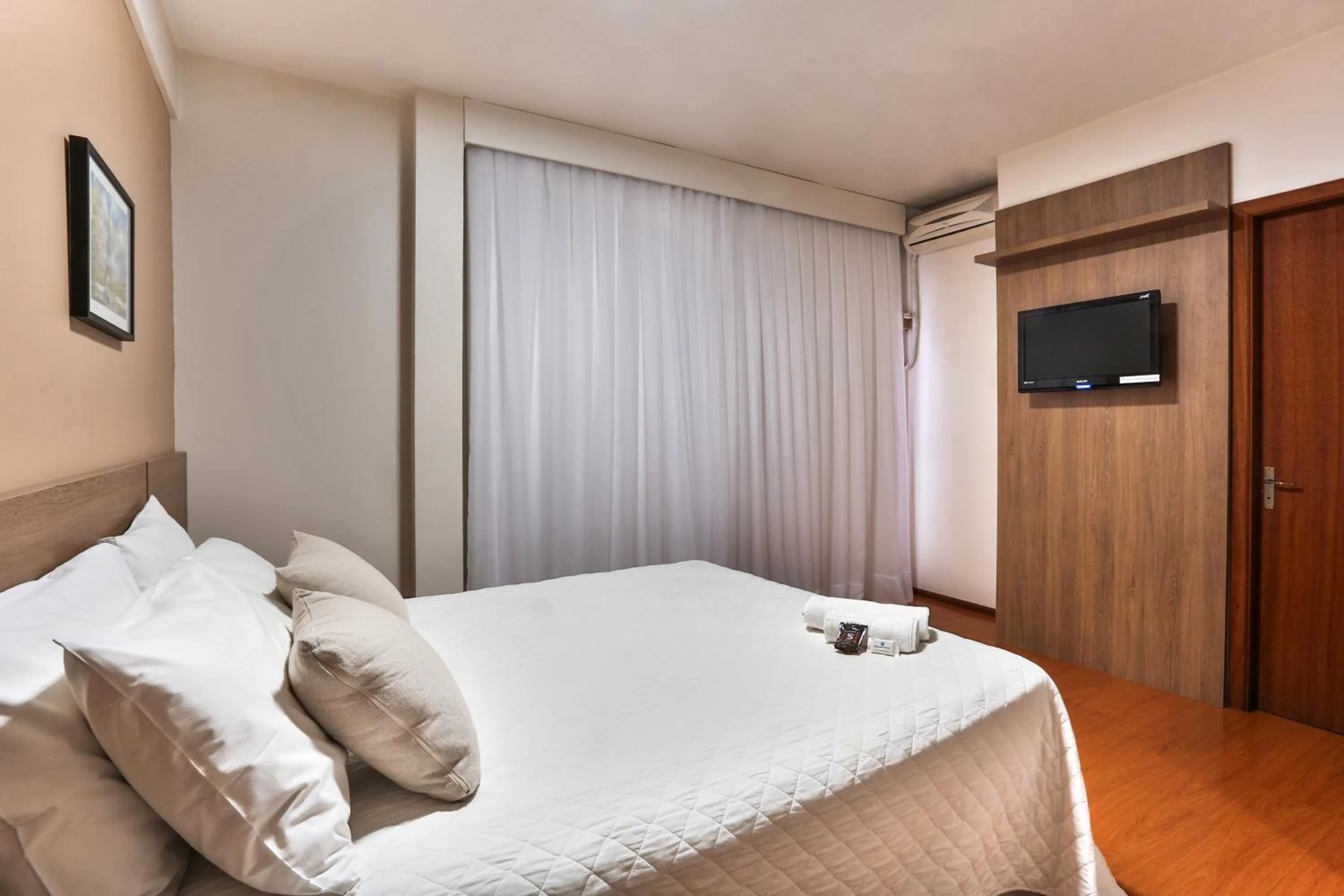 Bed in Zallon Hotel Executivo