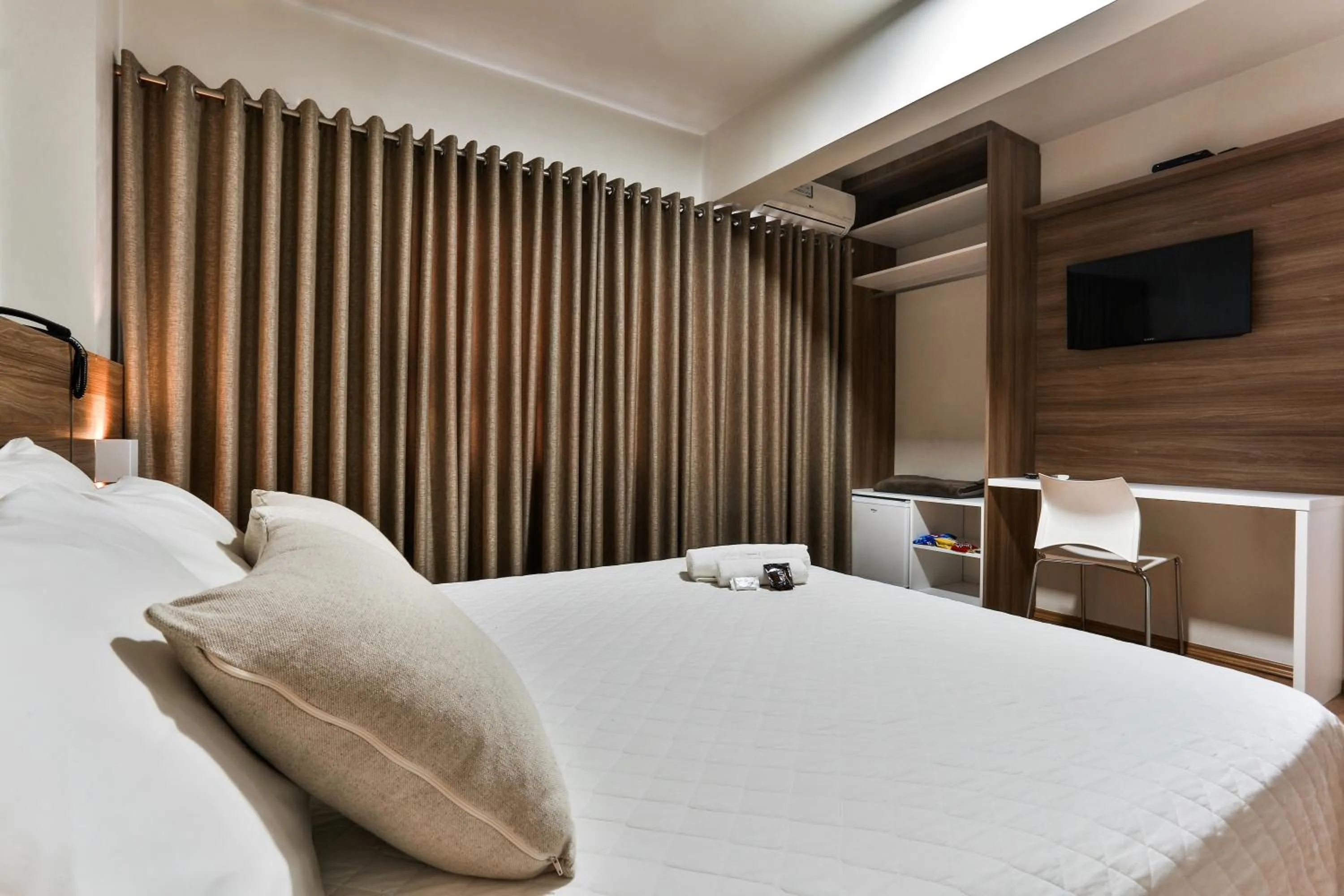 Bed in Zallon Hotel Executivo