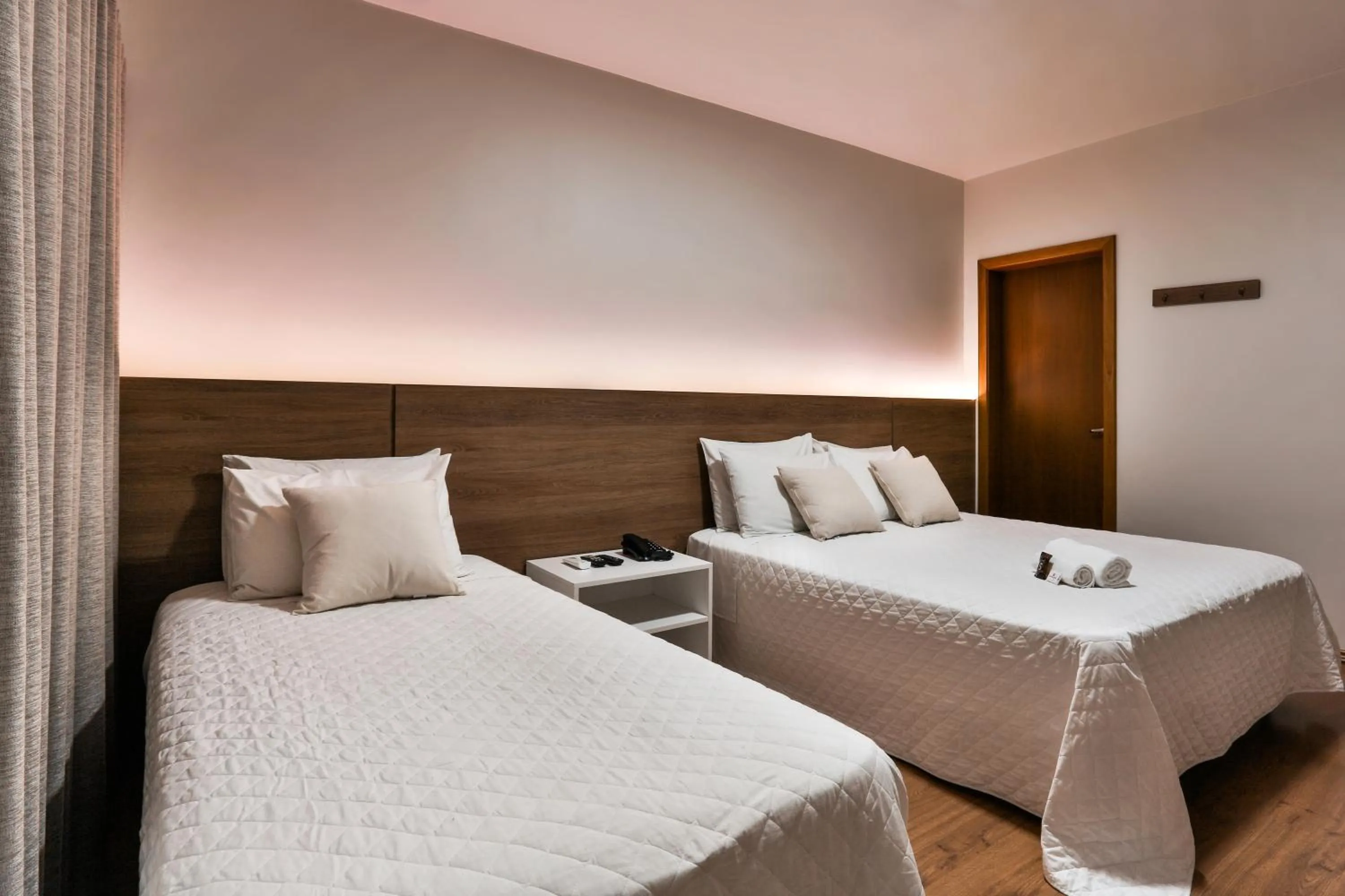 Bed in Zallon Hotel Executivo