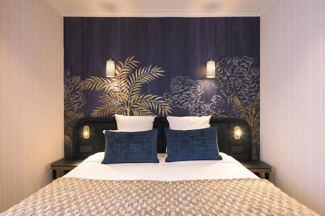 Bed in Hôtel Tourisme Avenue