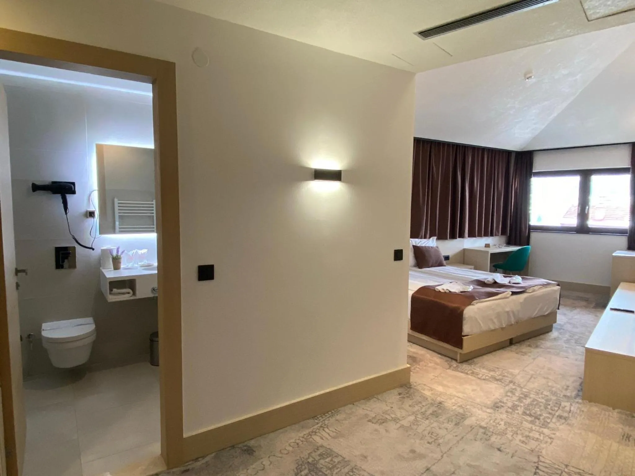 Photo of the whole room, Bed in Hotel Boss