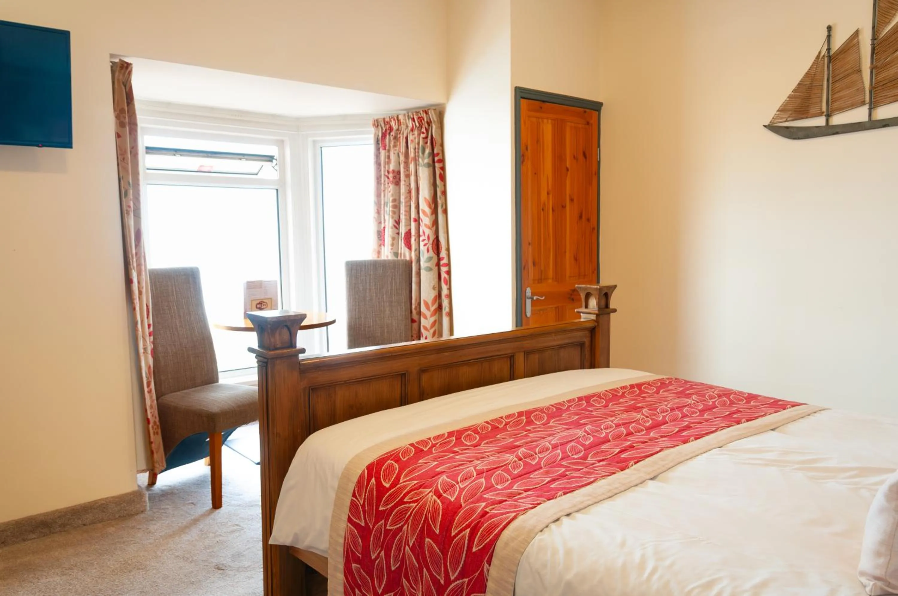 Bed in Claxton Hotel