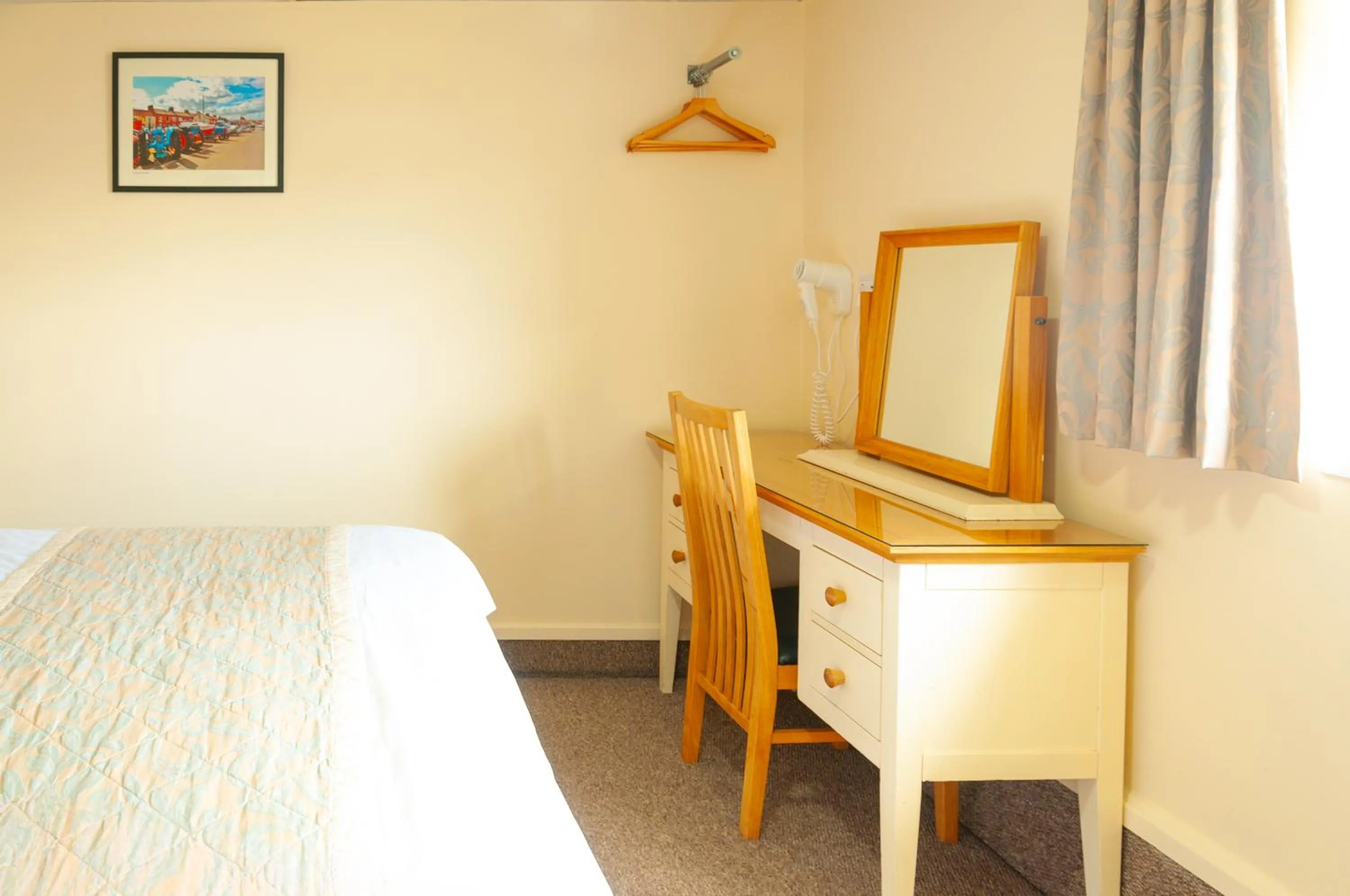 Bed in Claxton Hotel